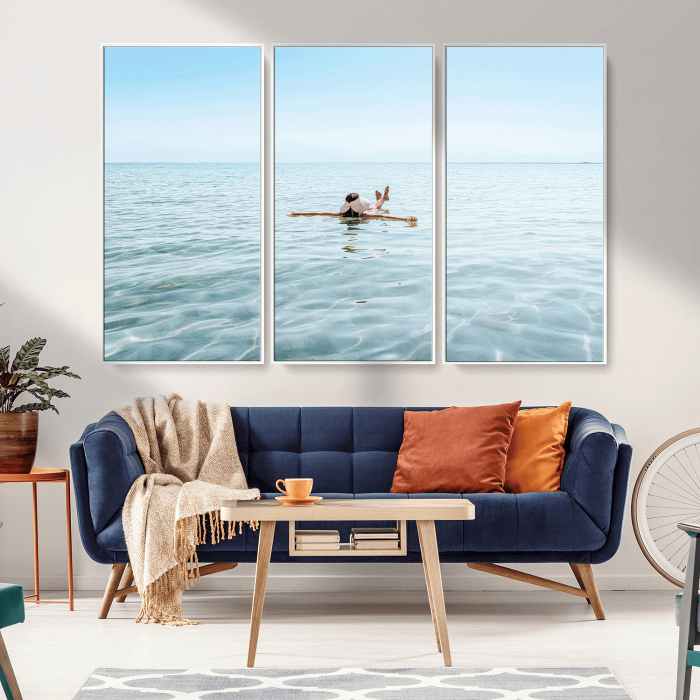 A peaceful minimalist scene of a person floating on crystal-clear water, surrounded by a vast open horizon, capturing relaxation and serenity in a tranquil aquatic setting.