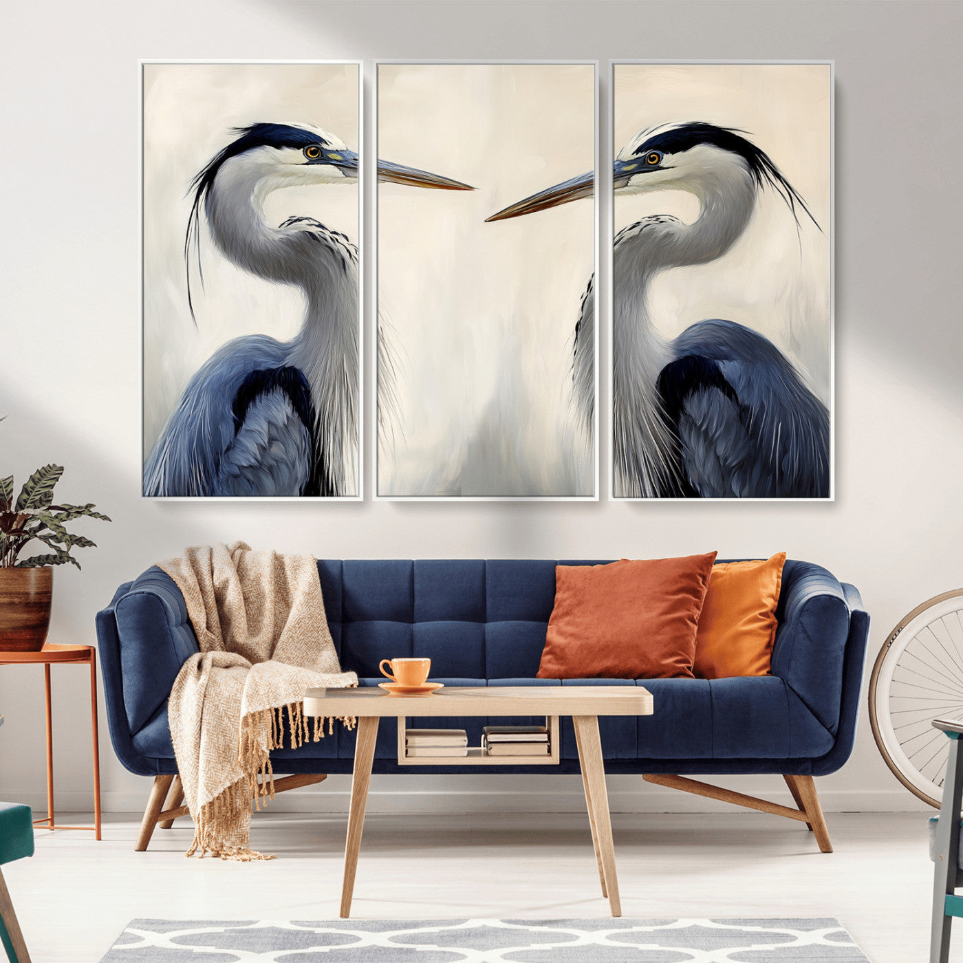 Two blue herons facing each other on a soft neutral background, ideal for coastal, tranquil, or nature-inspired minimalist interiors.