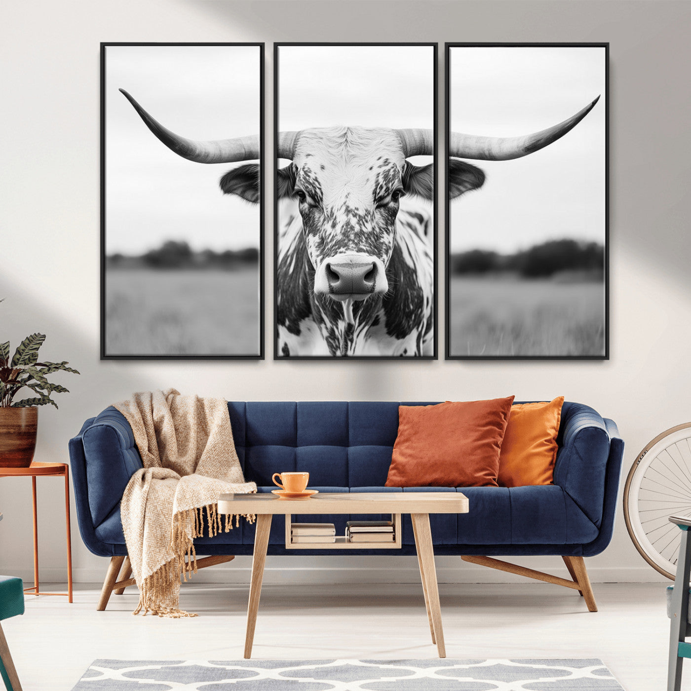 Capture the strength and elegance of nature with this striking black and white portrait of a longhorn cow. Its powerful presence makes a bold statement in any room.