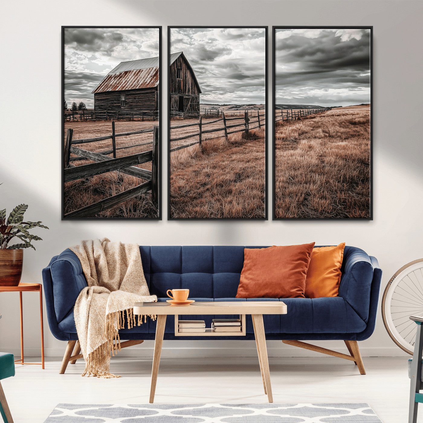 Framed canvas of a rustic barn under a moody sky with weathered fence and dark fields, ideal for farmhouse or rural-style wall decor.