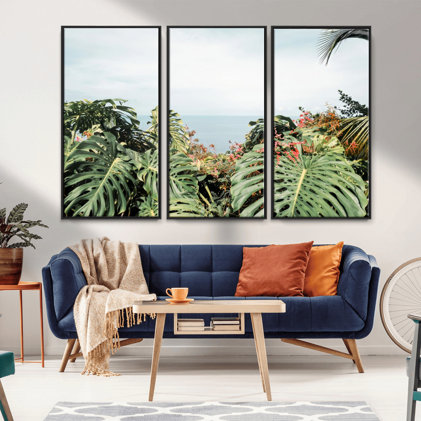 Monstera leaves and tropical flowers framing a calm ocean view, ideal for tropical coastal or exotic jungle-style interior wall decor.