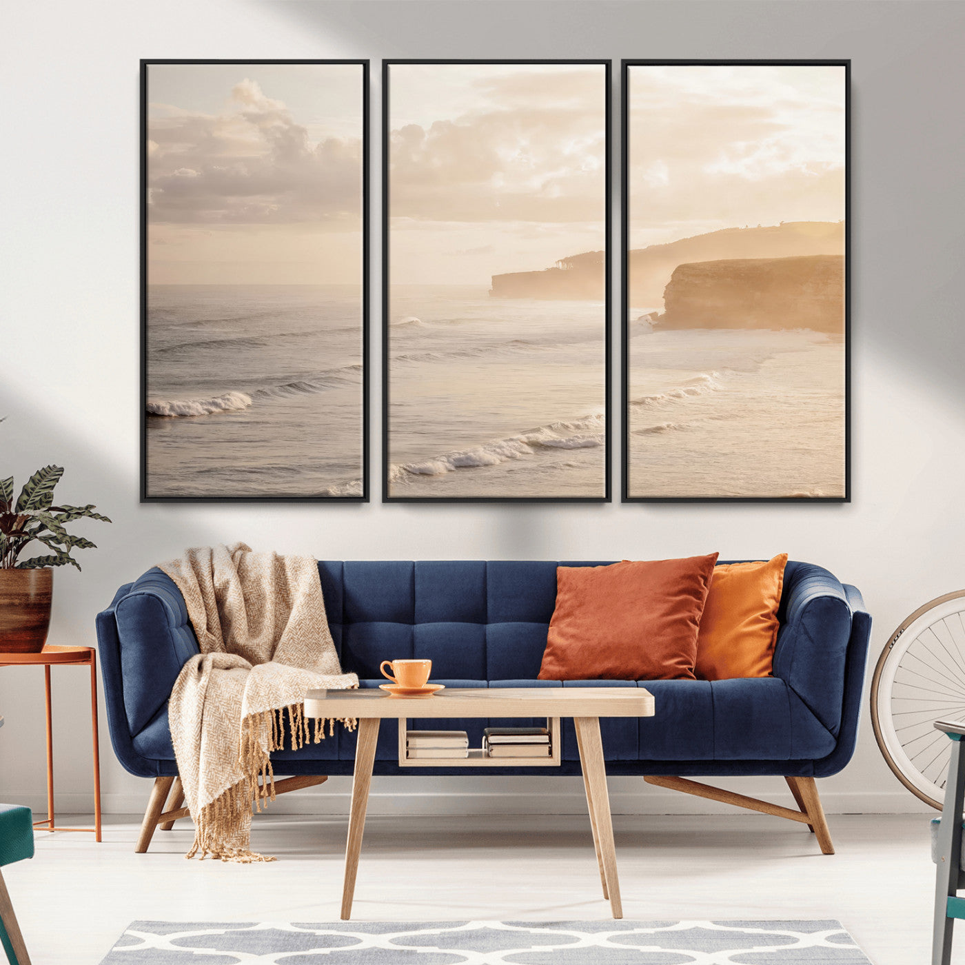 Golden hour seascape with misty cliffs and gentle waves rolling towards the shore, capturing a tranquil and warm coastal atmosphere.