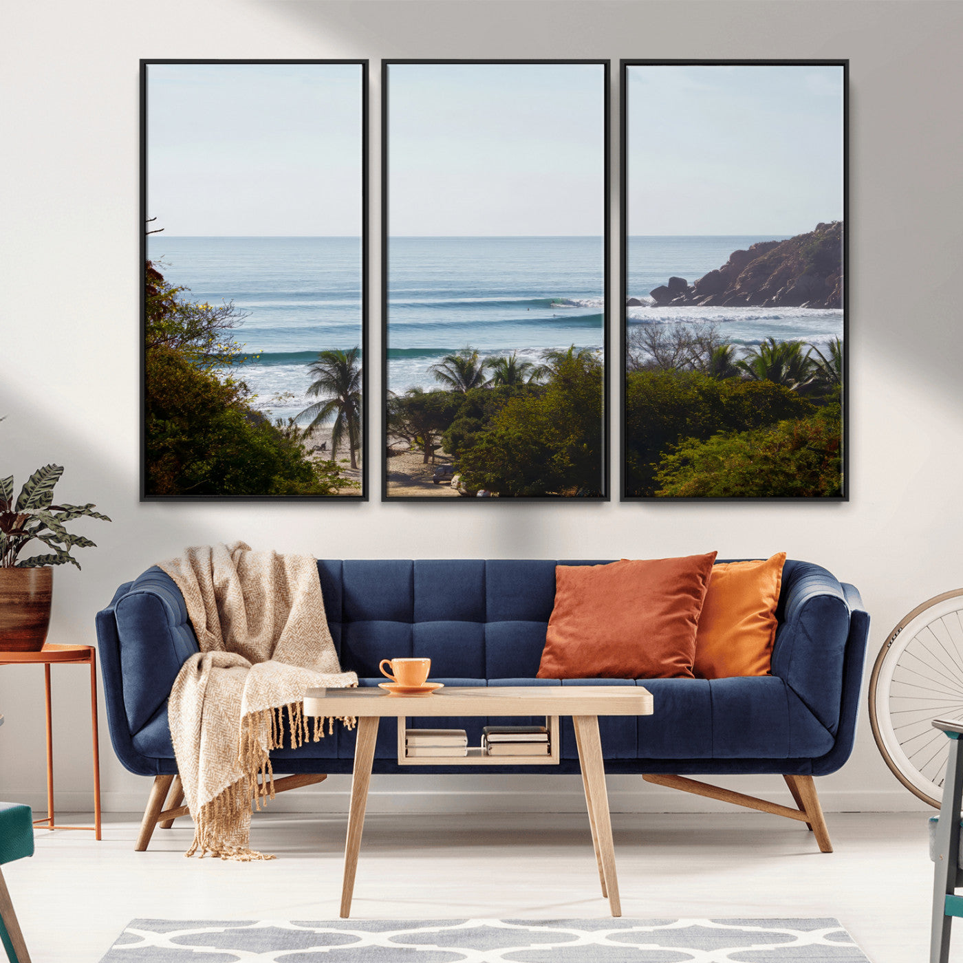 View of calm ocean waves with palm trees and a tropical coastline, ideal for coastal boho or beach-themed wall decor.