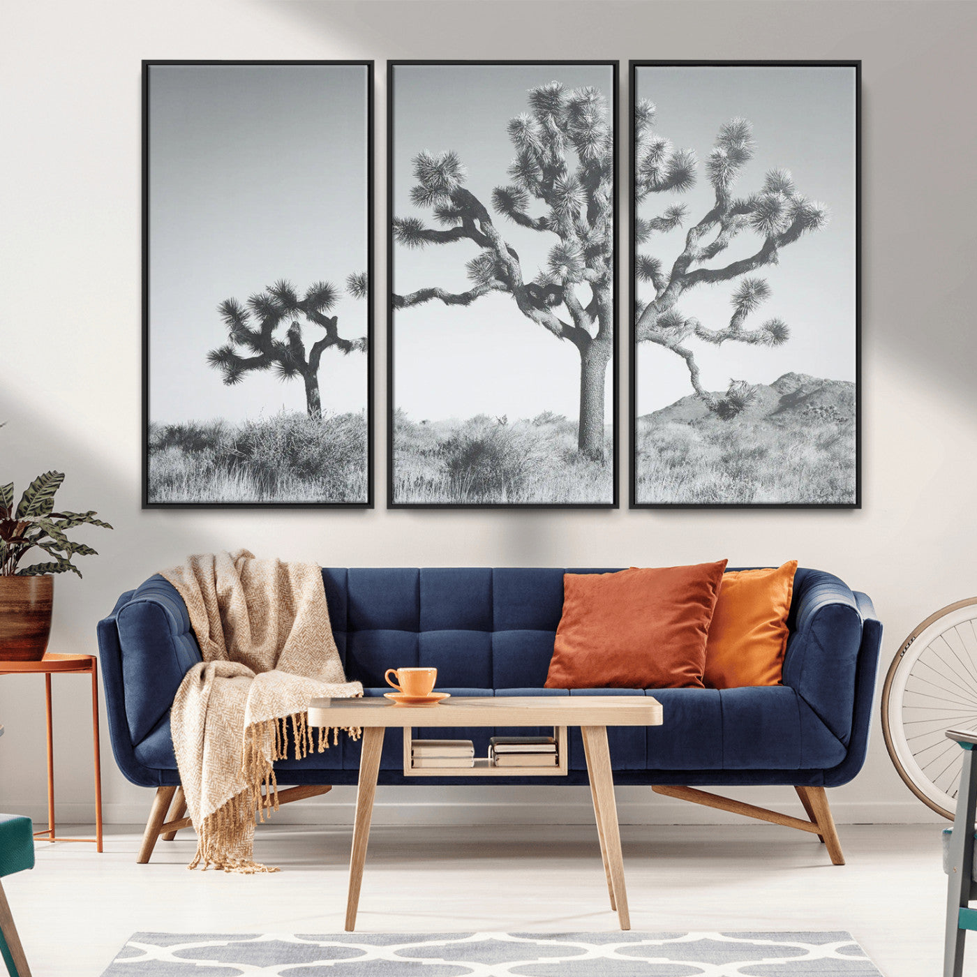 Black and white Joshua tree in a desert landscape with soft light and dry brush, perfect for rustic or minimalist home decor.
