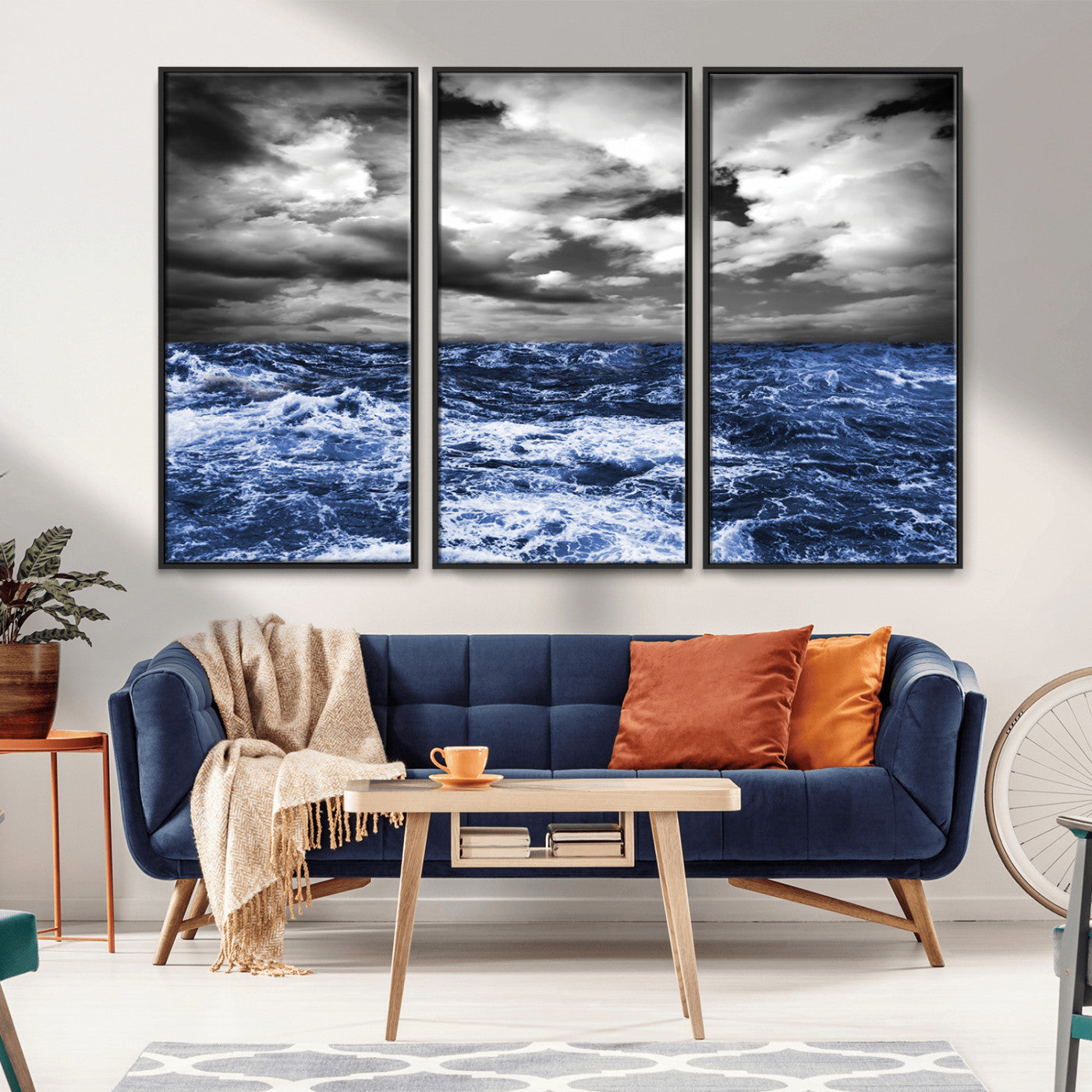 Moody canvas wall art of a stormy ocean under a dramatic black-and-white sky, perfect for bold or coastal-style interiors.