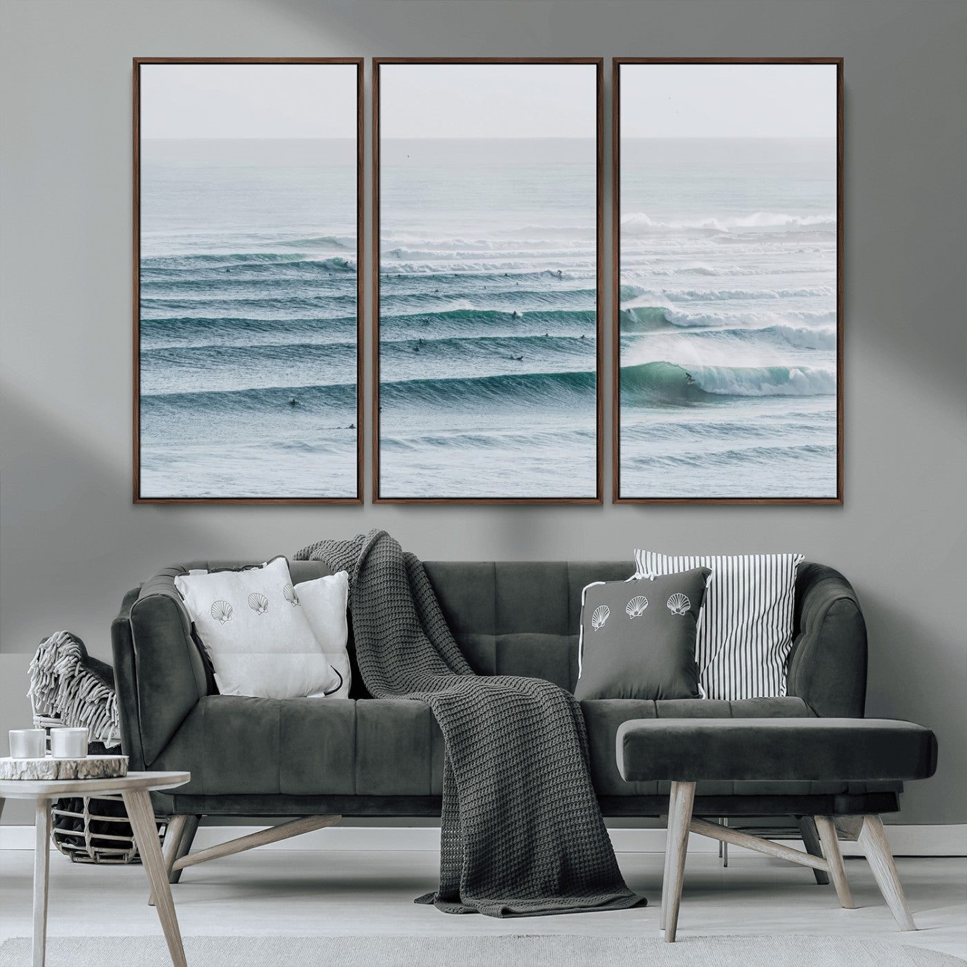 High-angle view of surfers lining up across layered ocean waves, ideal for minimal coastal or surf-inspired room decor.