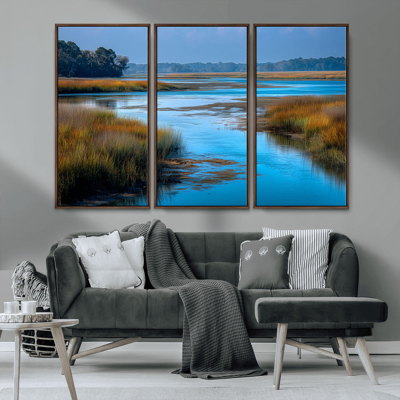 A peaceful marshland scene with calm blue water reflecting the surrounding grasses and trees, capturing the beauty of nature in a serene landscape.