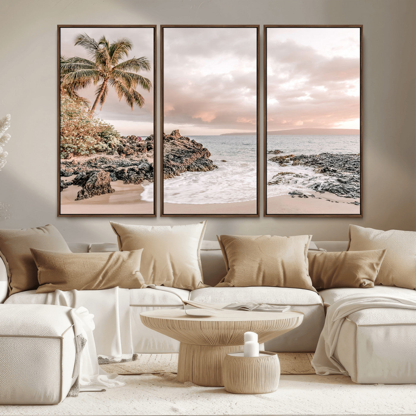 A peaceful beach scene with a palm tree and rocks, soft waves washing onto the shore under a soft pastel sky at sunset.