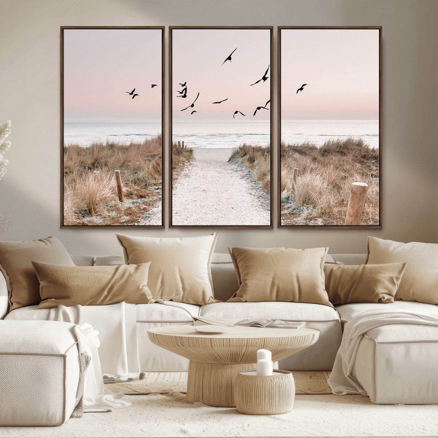 A peaceful coastal pathway leading to the ocean, with birds flying across a soft pastel sky, creating a calm and scenic beach atmosphere.