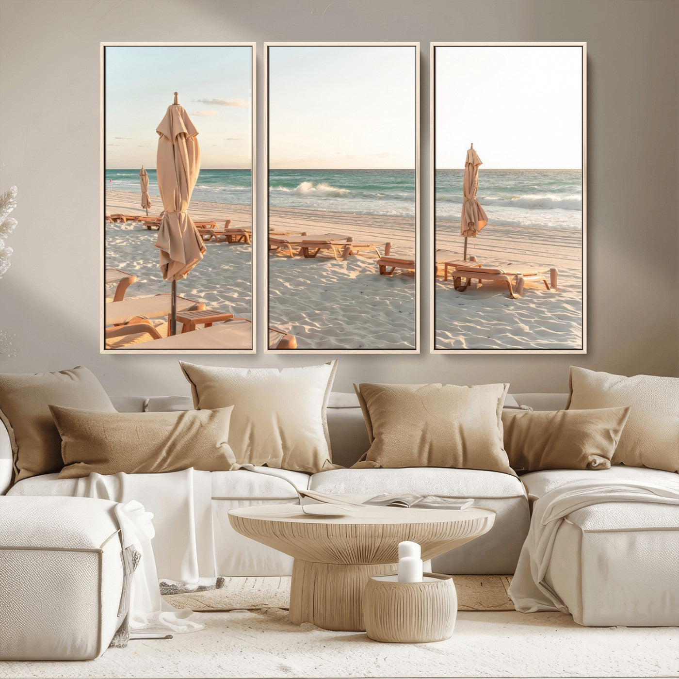 Minimalist photo of empty beach loungers and umbrellas on soft sand, ideal for calm seaside or pastel coastal-style home decor.