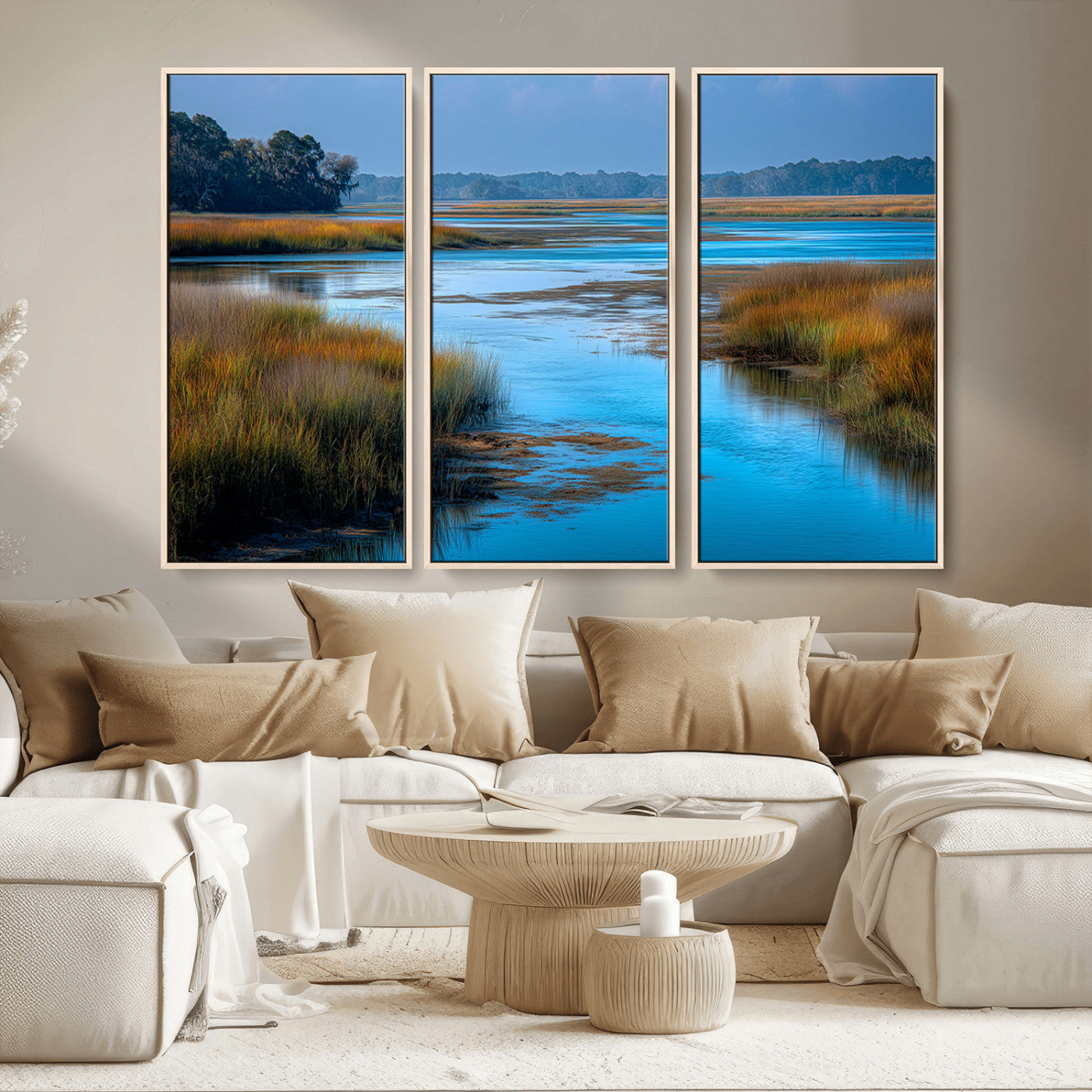 A peaceful marshland scene with calm blue water reflecting the surrounding grasses and trees, capturing the beauty of nature in a serene landscape.