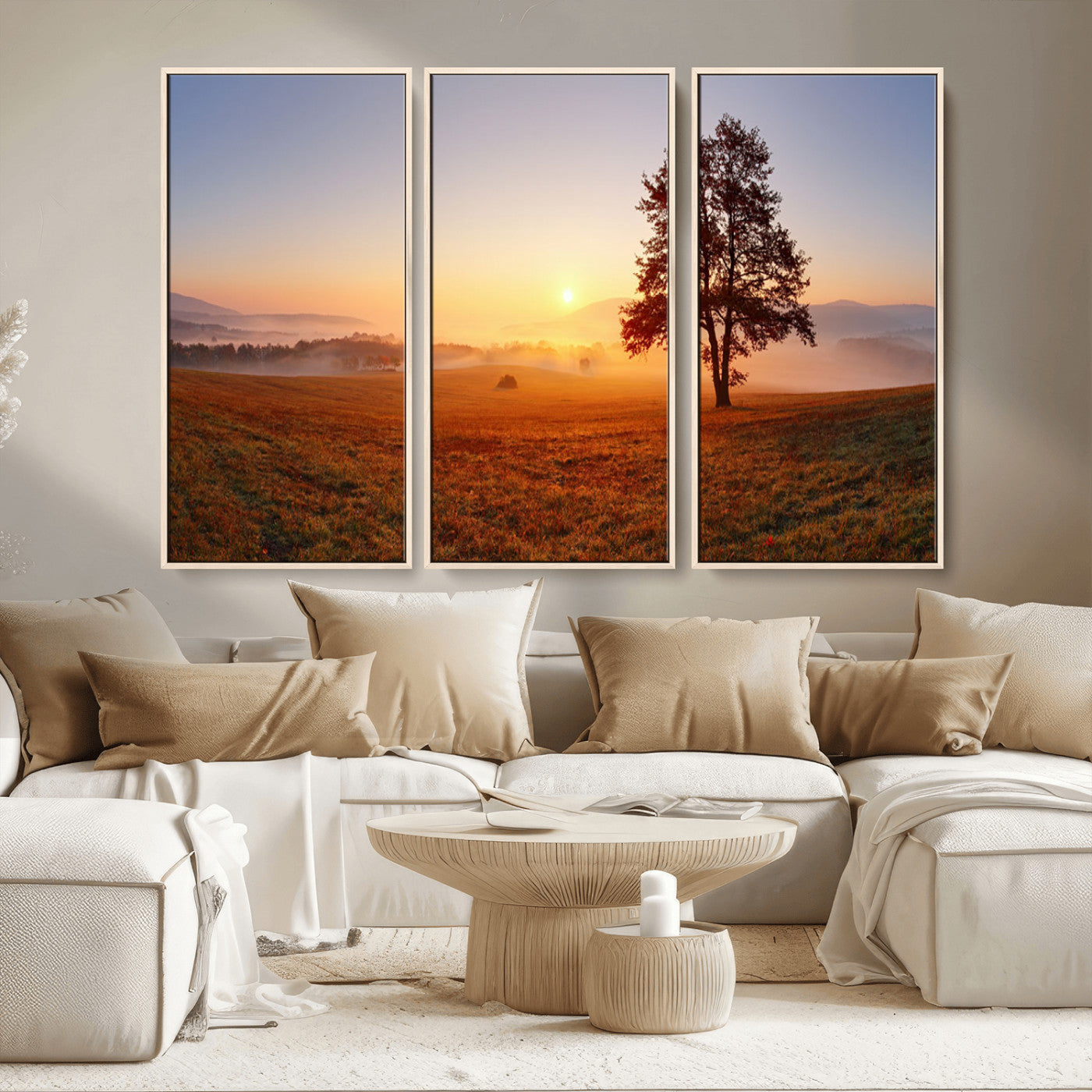 A tranquil landscape at sunrise with a mist-covered field and a lone tree, creating a peaceful and natural atmosphere.