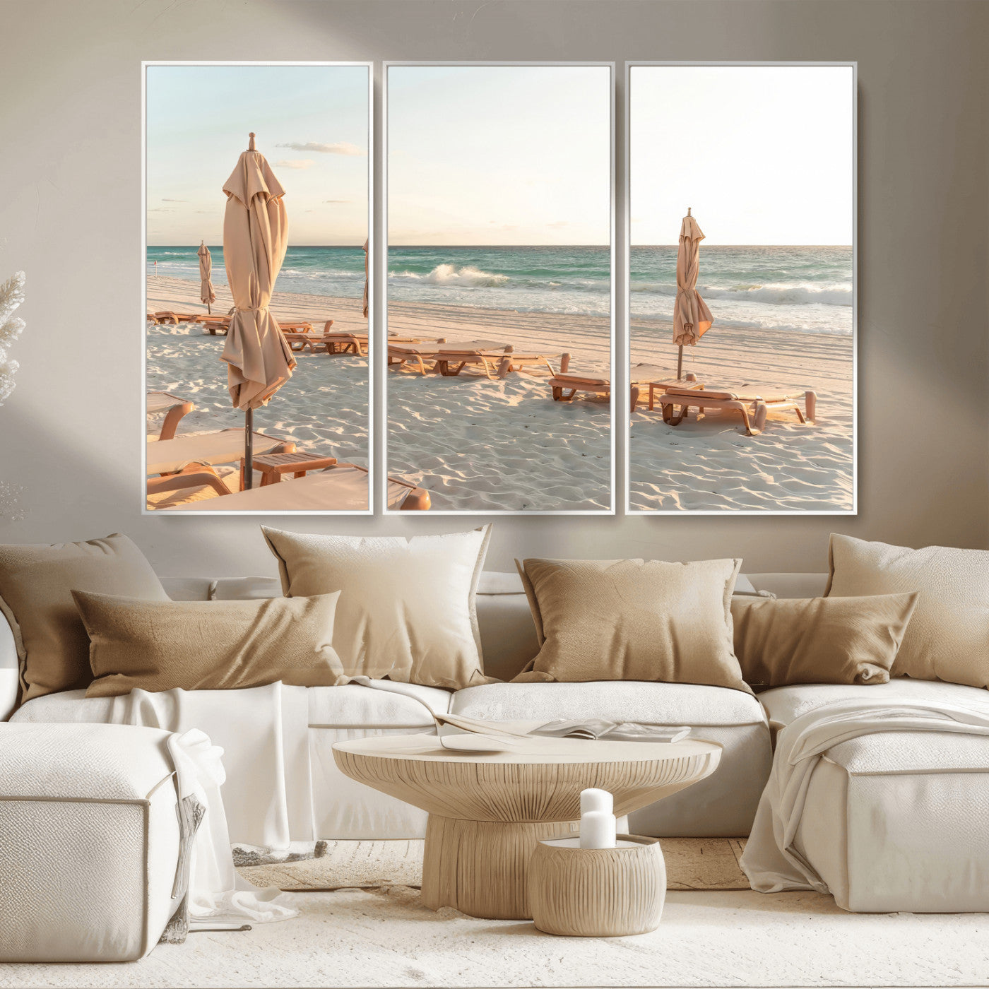 Minimalist photo of empty beach loungers and umbrellas on soft sand, ideal for calm seaside or pastel coastal-style home decor.