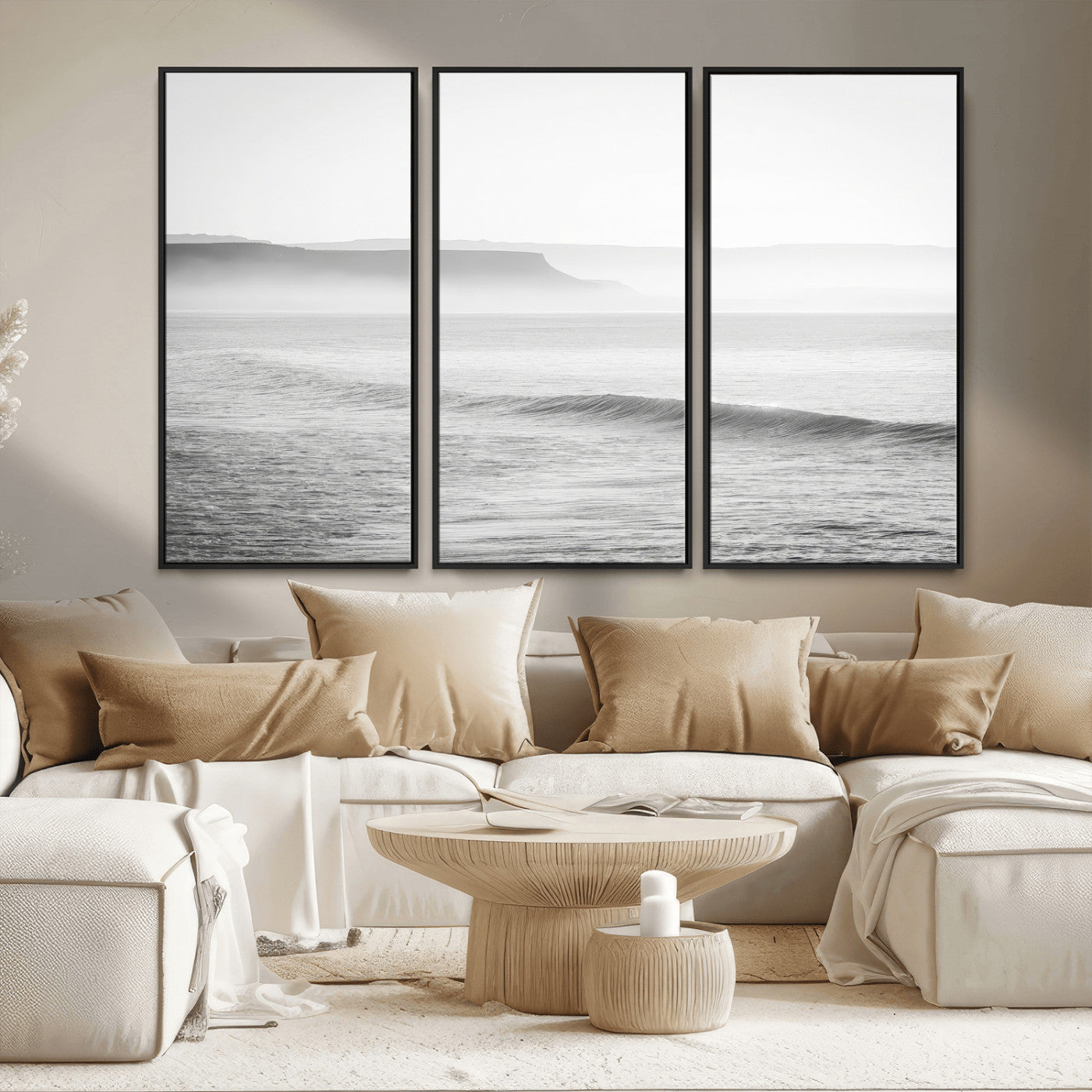 A black and white minimalist seascape featuring soft rolling waves and misty distant cliffs, creating a serene and timeless coastal atmosphere.