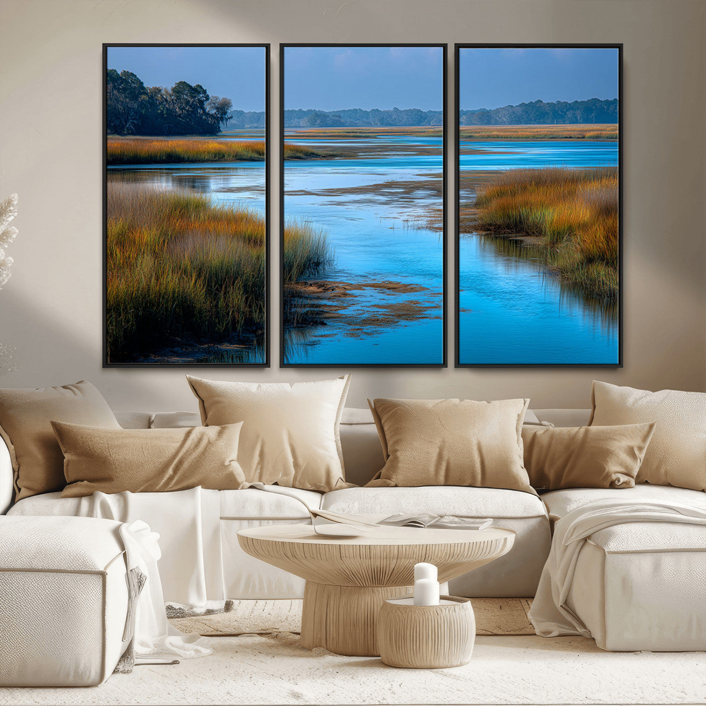 A peaceful marshland scene with calm blue water reflecting the surrounding grasses and trees, capturing the beauty of nature in a serene landscape.