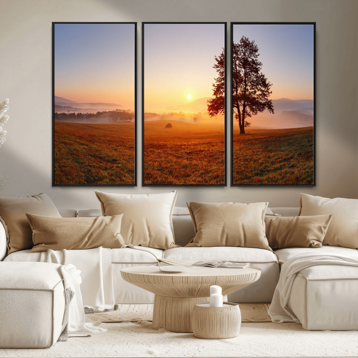 A tranquil landscape at sunrise with a mist-covered field and a lone tree, creating a peaceful and natural atmosphere.