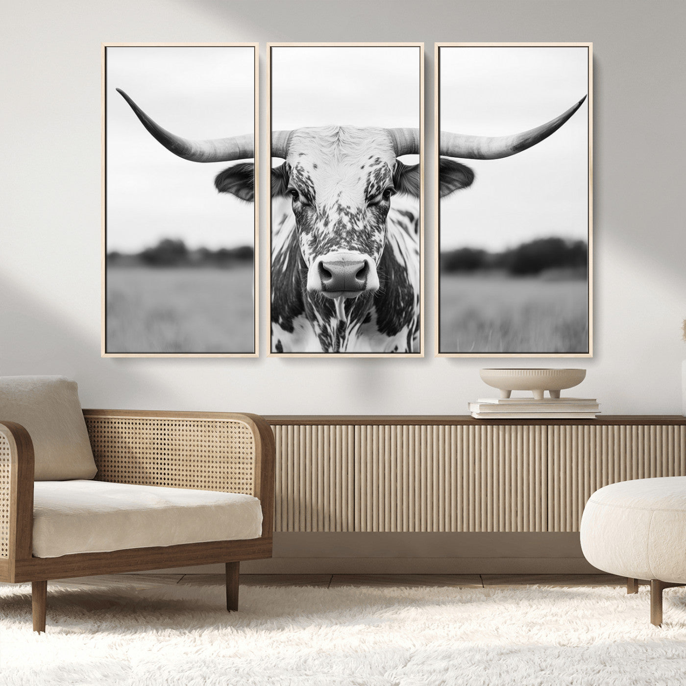 Capture the strength and elegance of nature with this striking black and white portrait of a longhorn cow. Its powerful presence makes a bold statement in any room.