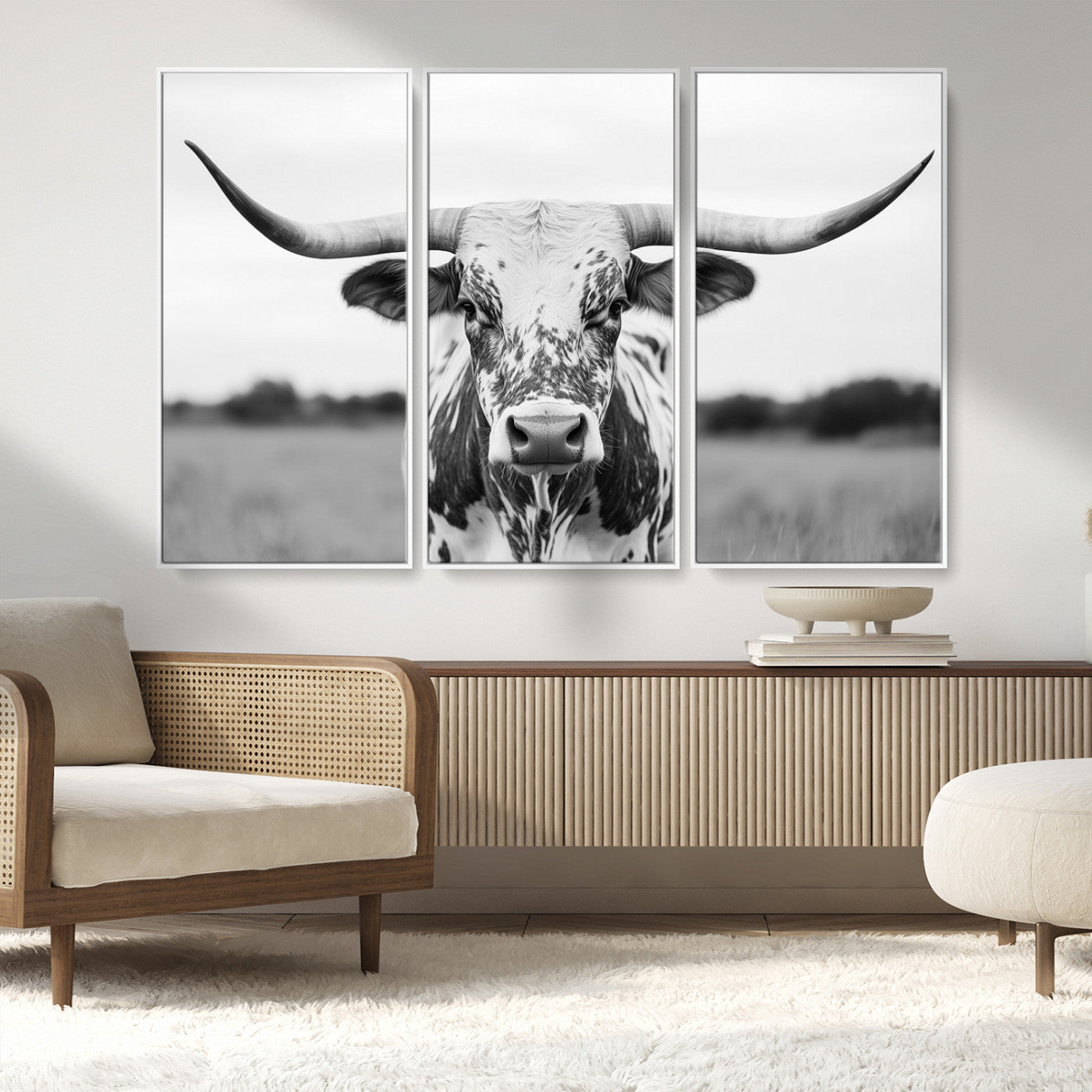 Capture the strength and elegance of nature with this striking black and white portrait of a longhorn cow. Its powerful presence makes a bold statement in any room.