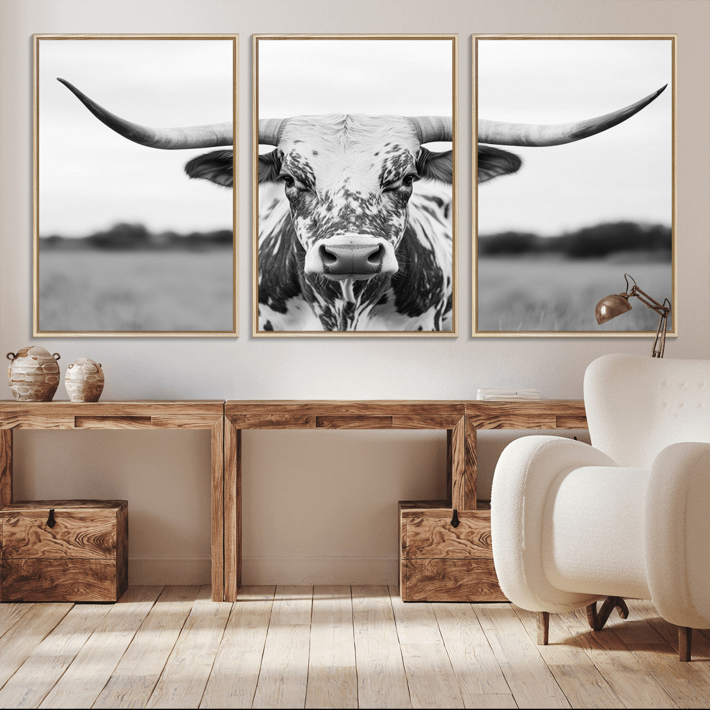 Capture the strength and elegance of nature with this striking black and white portrait of a longhorn cow. Its powerful presence makes a bold statement in any room.