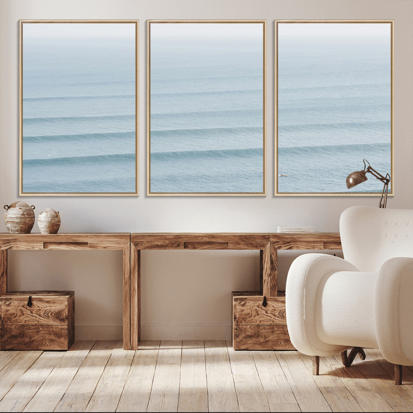 Framed canvas of repeating ocean waves with a distant solo surfer, ideal for minimalist ocean or calm coastal wall decor.