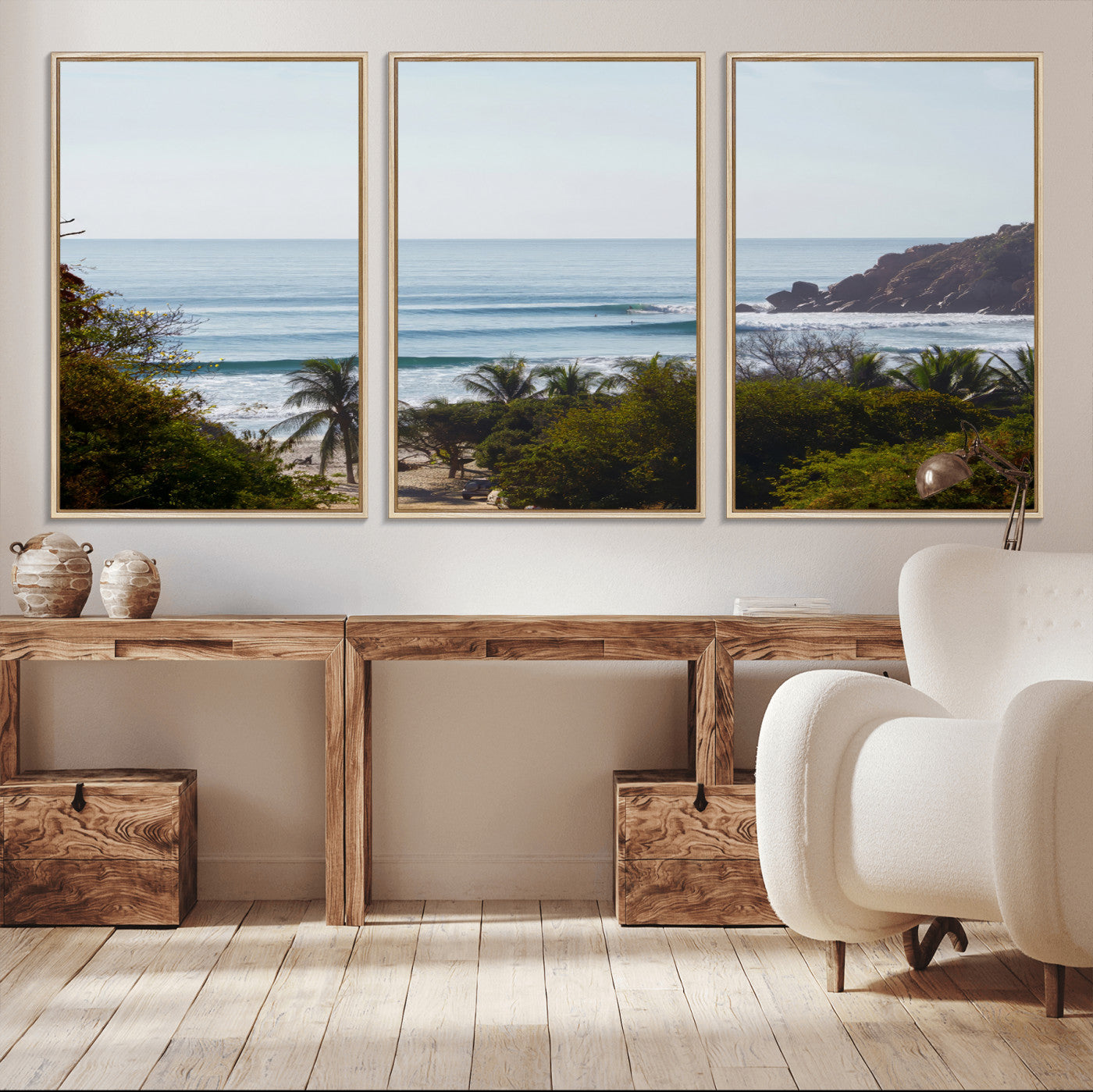 View of calm ocean waves with palm trees and a tropical coastline, ideal for coastal boho or beach-themed wall decor.