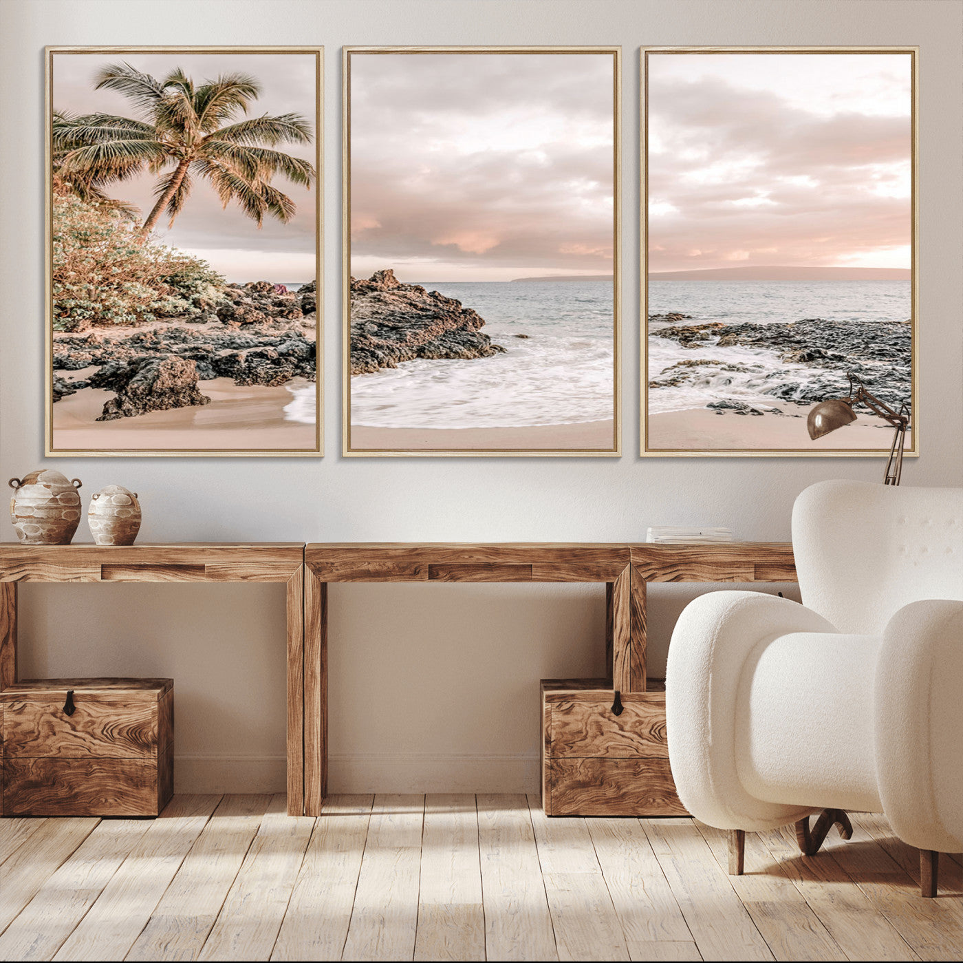 A peaceful beach scene with a palm tree and rocks, soft waves washing onto the shore under a soft pastel sky at sunset.