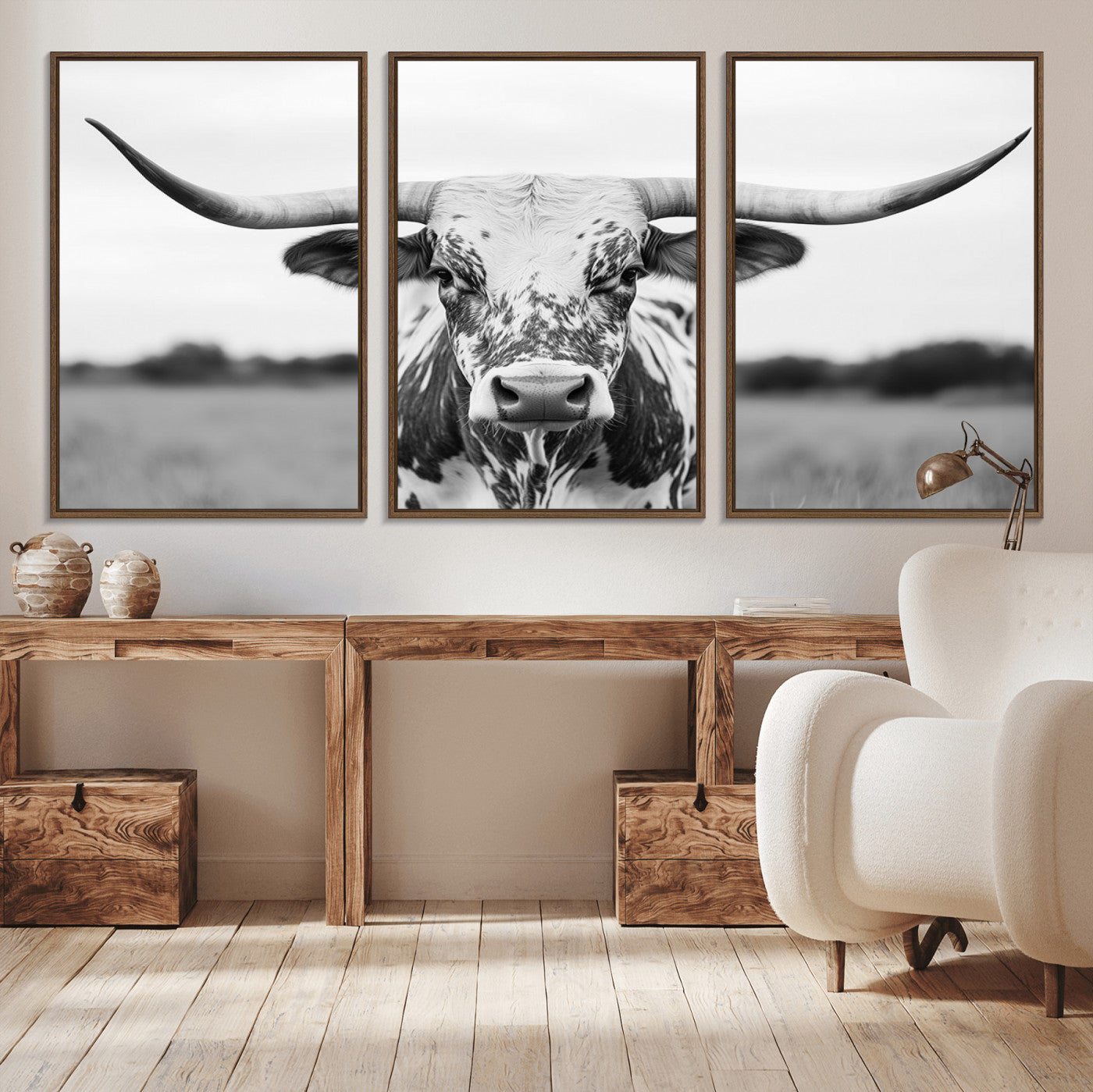 Capture the strength and elegance of nature with this striking black and white portrait of a longhorn cow. Its powerful presence makes a bold statement in any room.