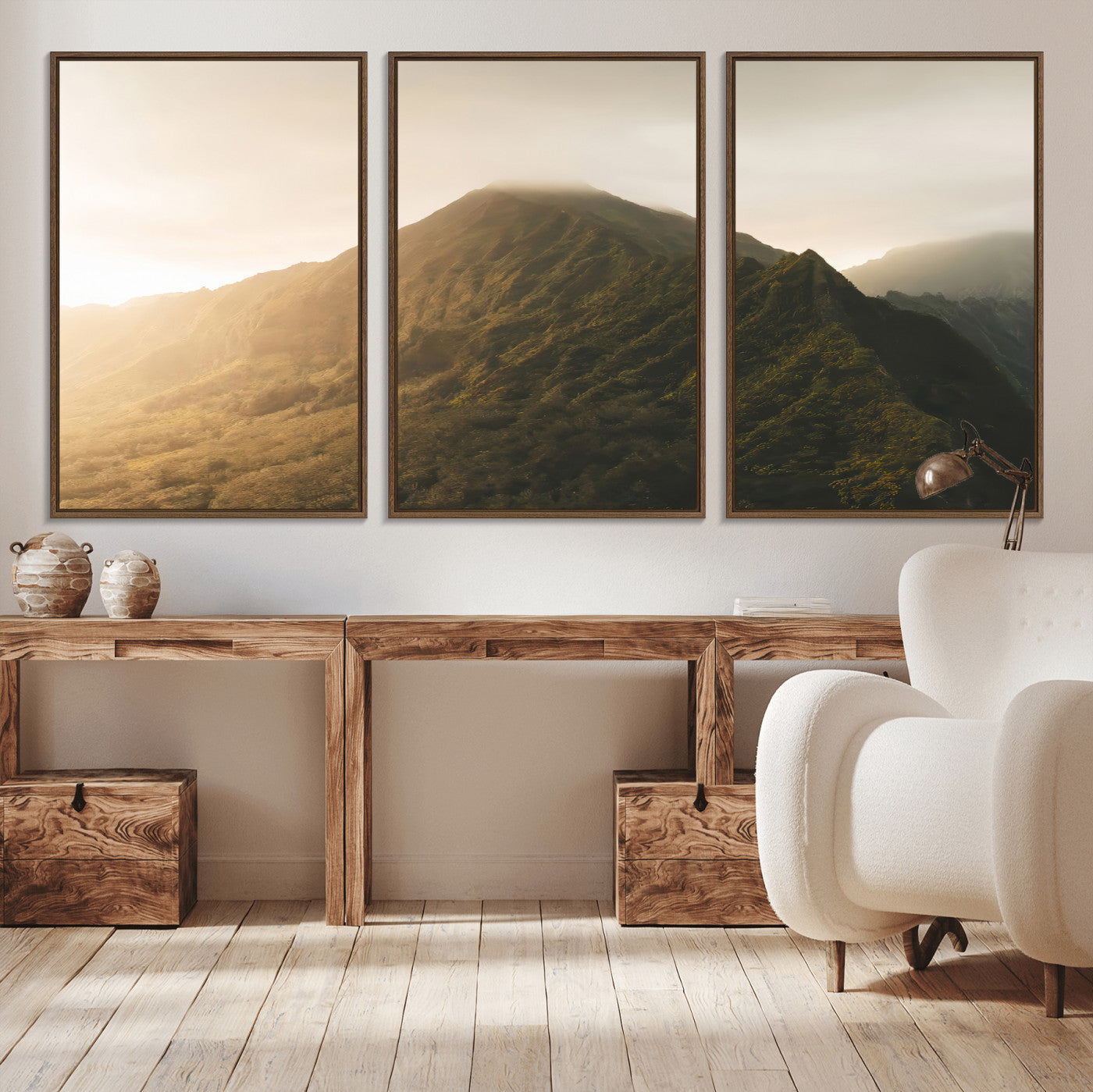 Sunlit mountain peak with mist rolling over its rugged slopes, bathed in golden light, creating a warm and tranquil nature-inspired scene.