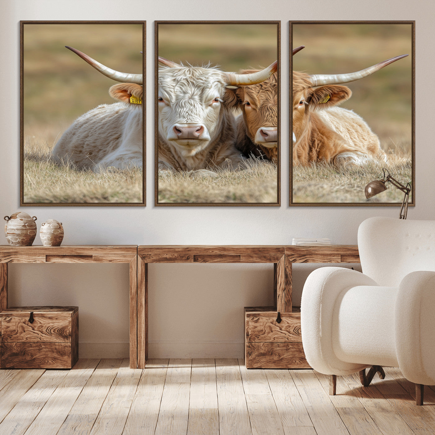 Two cows laying closely in a dry grassy field, captured in soft light, perfect for rustic farmhouse or western style home decor.