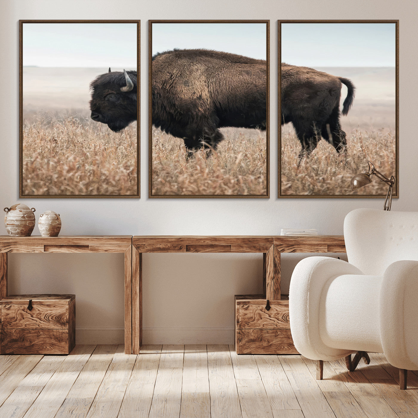 A lone bison stands in a vast prairie under a soft sky, evoking freedom and rustic charm for western or farmhouse inspired interiors.