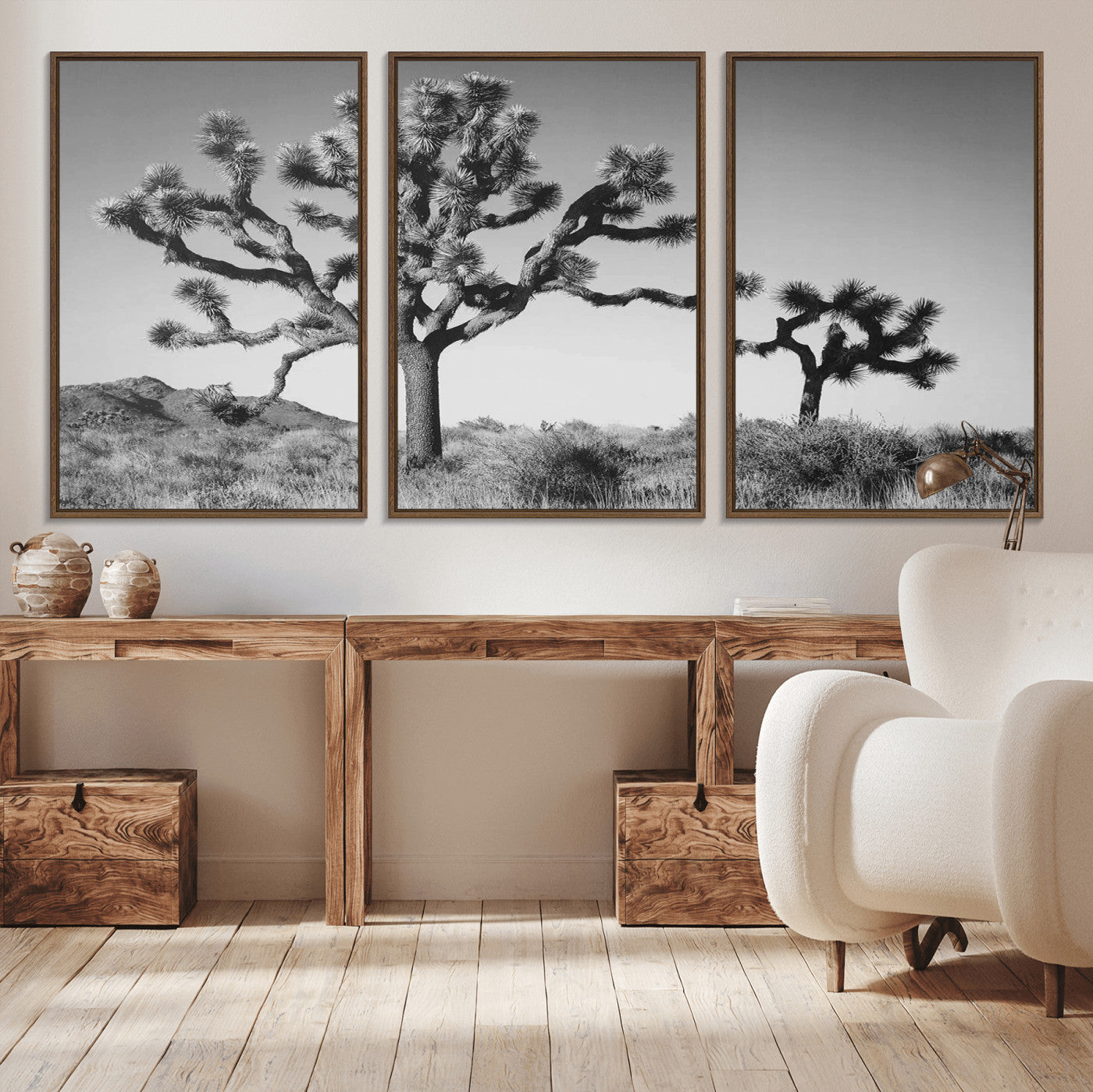 Black and white Joshua trees in a rugged desert landscape, creating a calm and minimalist feel for natural or rustic-themed interiors.