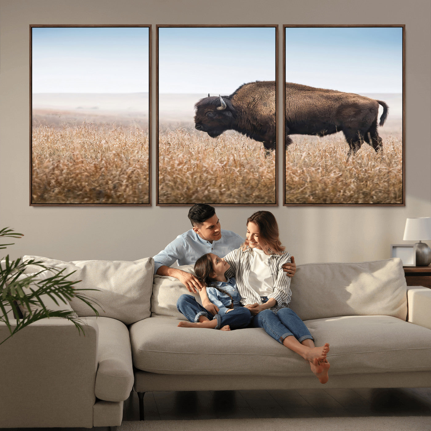 A majestic bison standing in an open prairie field, its strong form blending into the golden grass under a vast blue sky, evoking the wild spirit of the American plains.