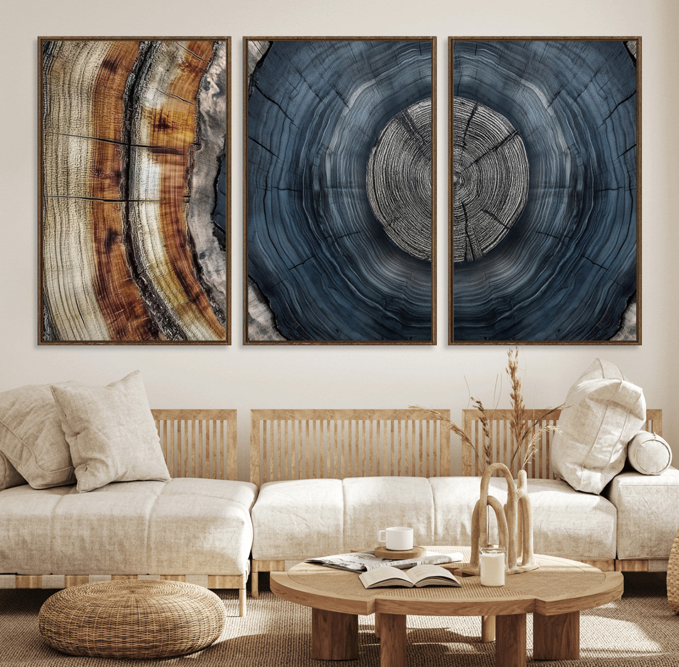 A stunning close-up of a tree trunk showing the intricate, circular growth rings, showcasing the natural textures and rich contrasts in deep blues, browns, and silvers.
