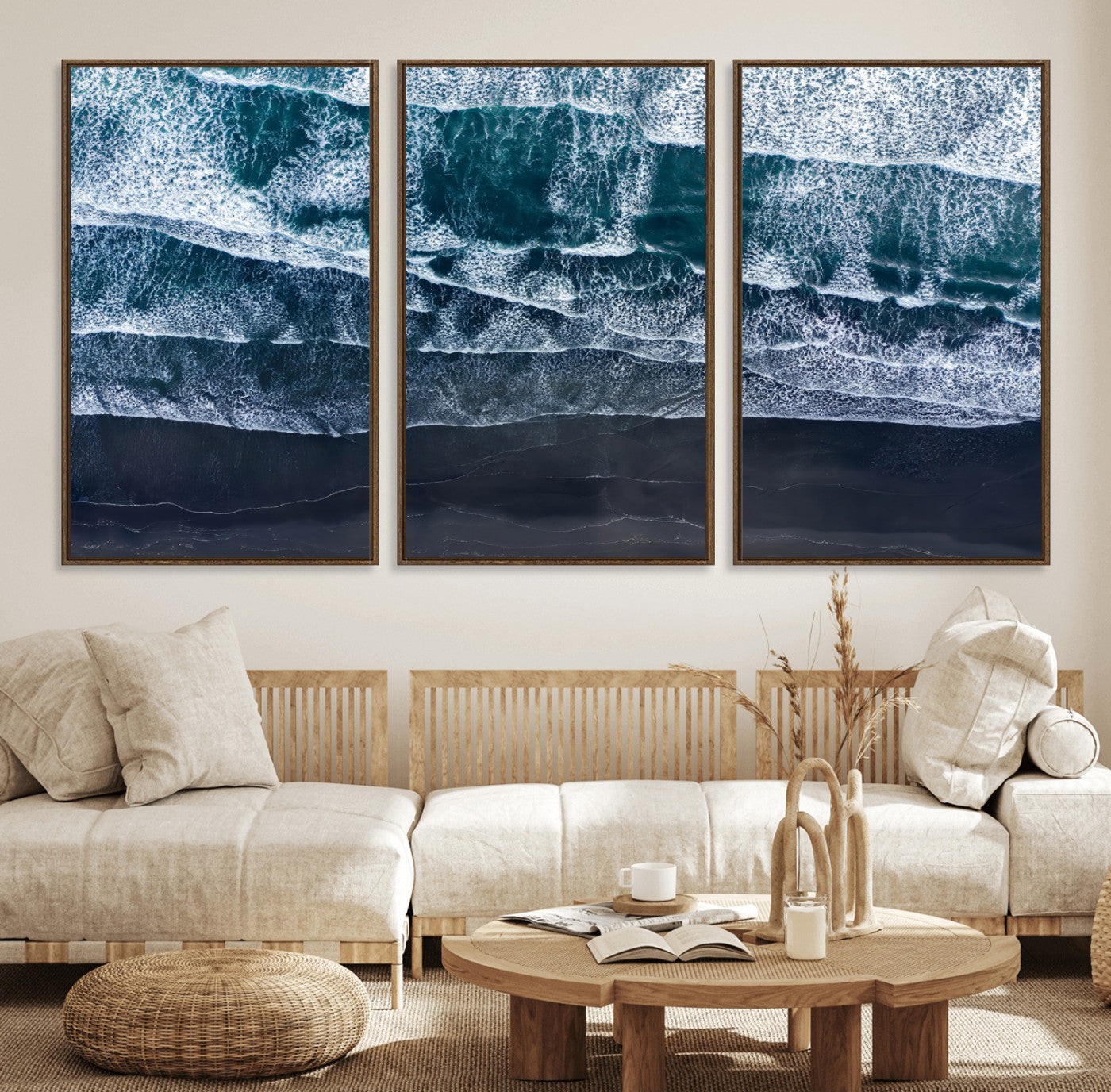 Canvas of aerial ocean waves crashing onto a black sand beach in moody tones, ideal for modern coastal or minimalist home decor.