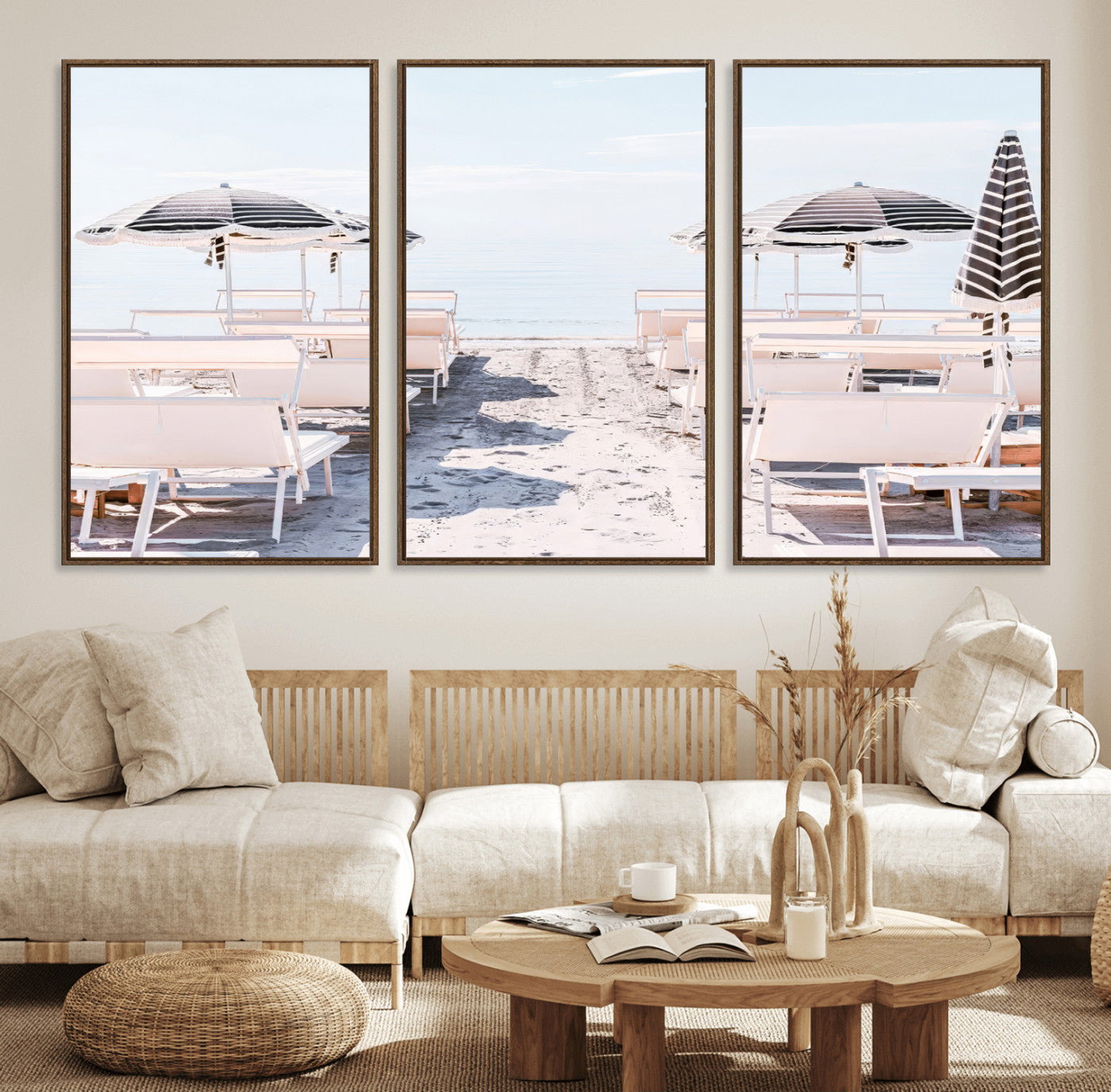 A serene minimalist beach scene featuring striped umbrellas, soft pastel sand, and an elegant lounge setup, creating a tranquil and stylish coastal retreat.