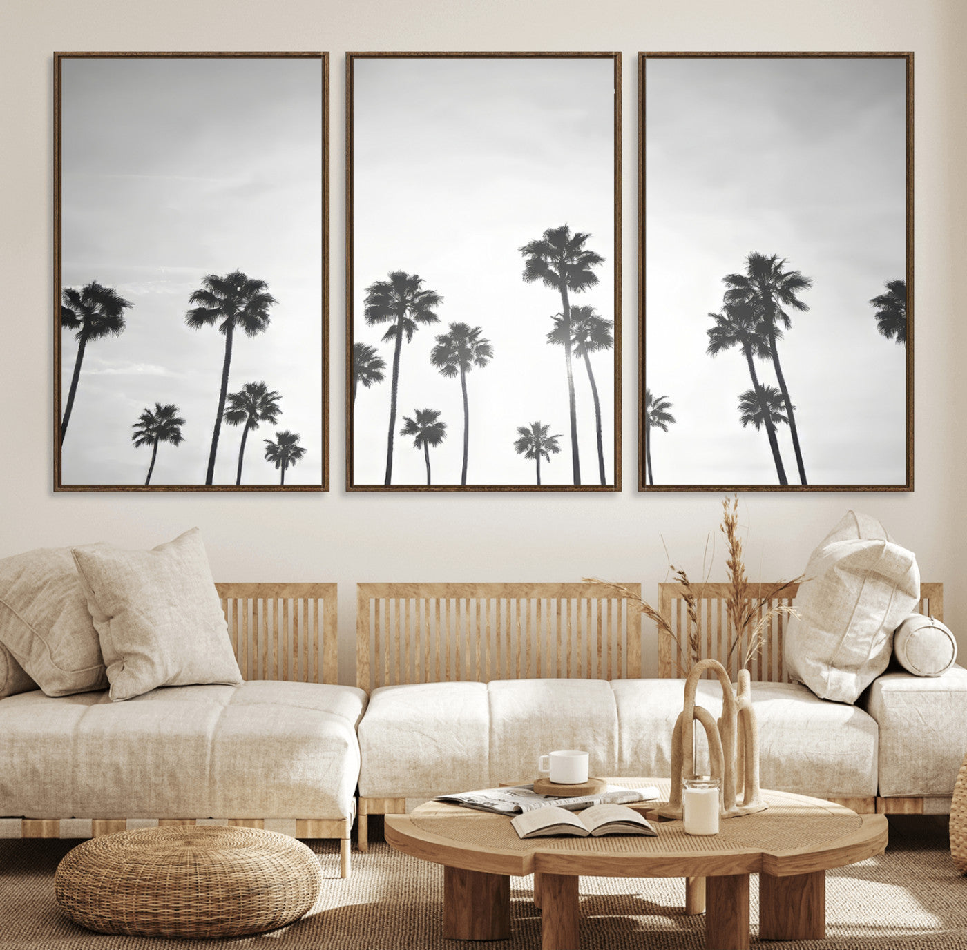 A black and white minimalist scene featuring tall palm trees silhouetted against a bright sky, creating a dreamy and timeless tropical aesthetic.