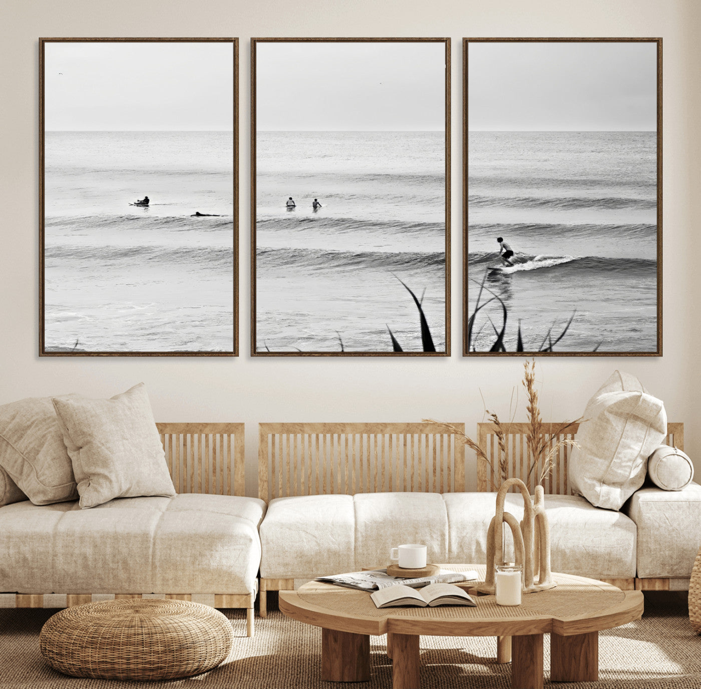 Monochrome canvas of surfers on calm ocean waves, ideal for minimalist coastal or beach-inspired interior decor.