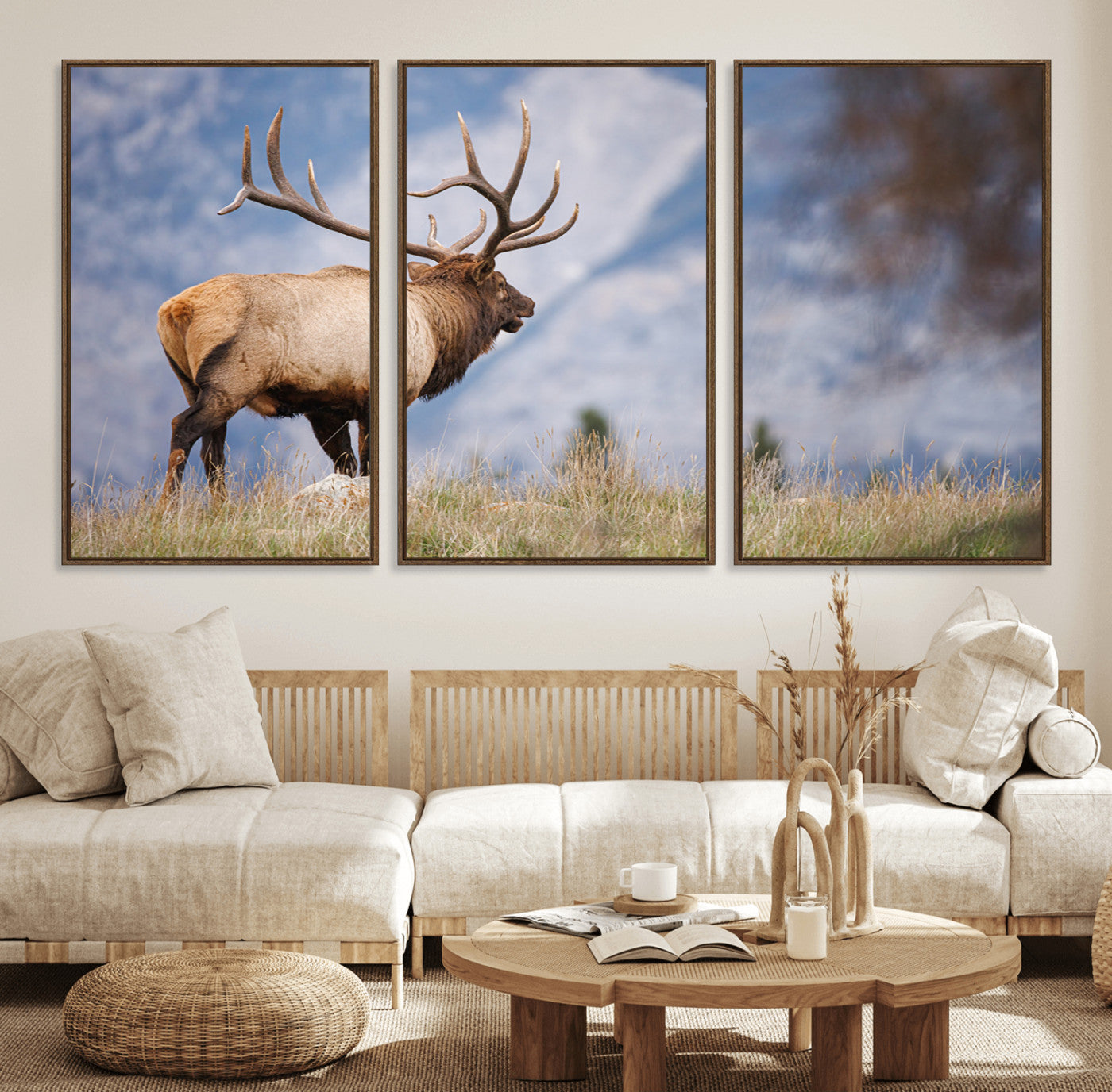 Elk with antlers standing on grass with mountain background, ideal for rustic, cabin, or lodge-inspired wall decor.