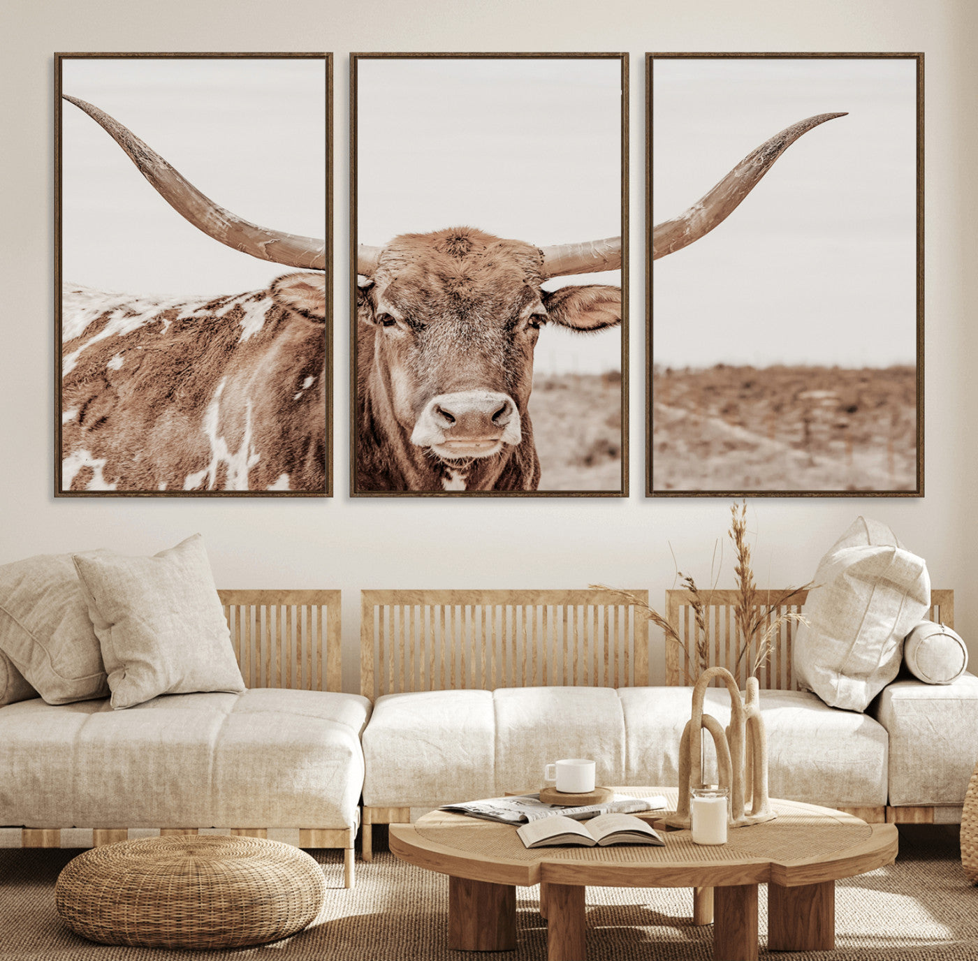 A longhorn cow in soft beige desert tones, standing calmly in open land, perfect for neutral western or rustic farmhouse interiors.