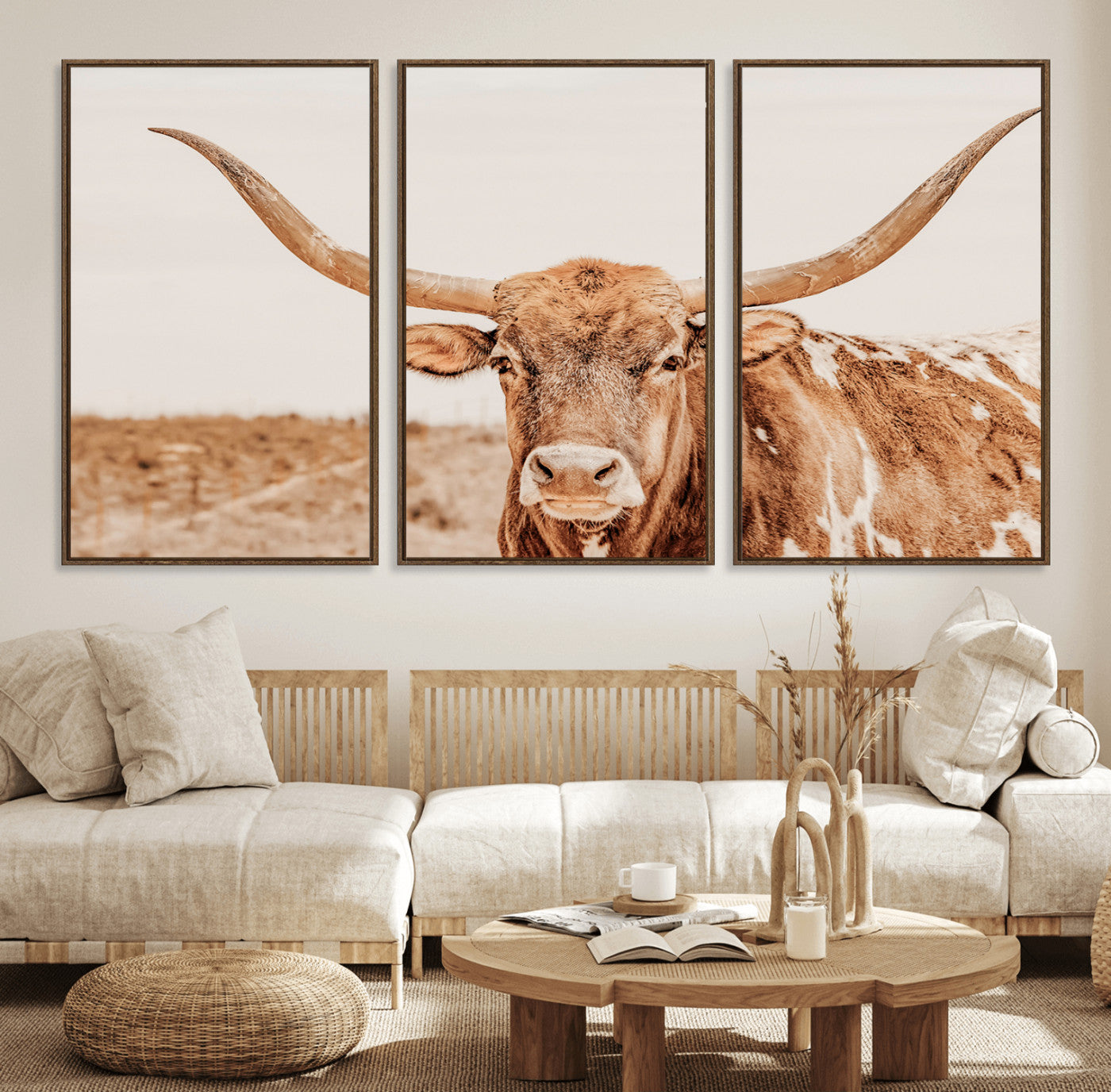 A longhorn bull standing proudly in a sunlit desert field with warm neutral tones, ideal for rustic western or farmhouse interiors.