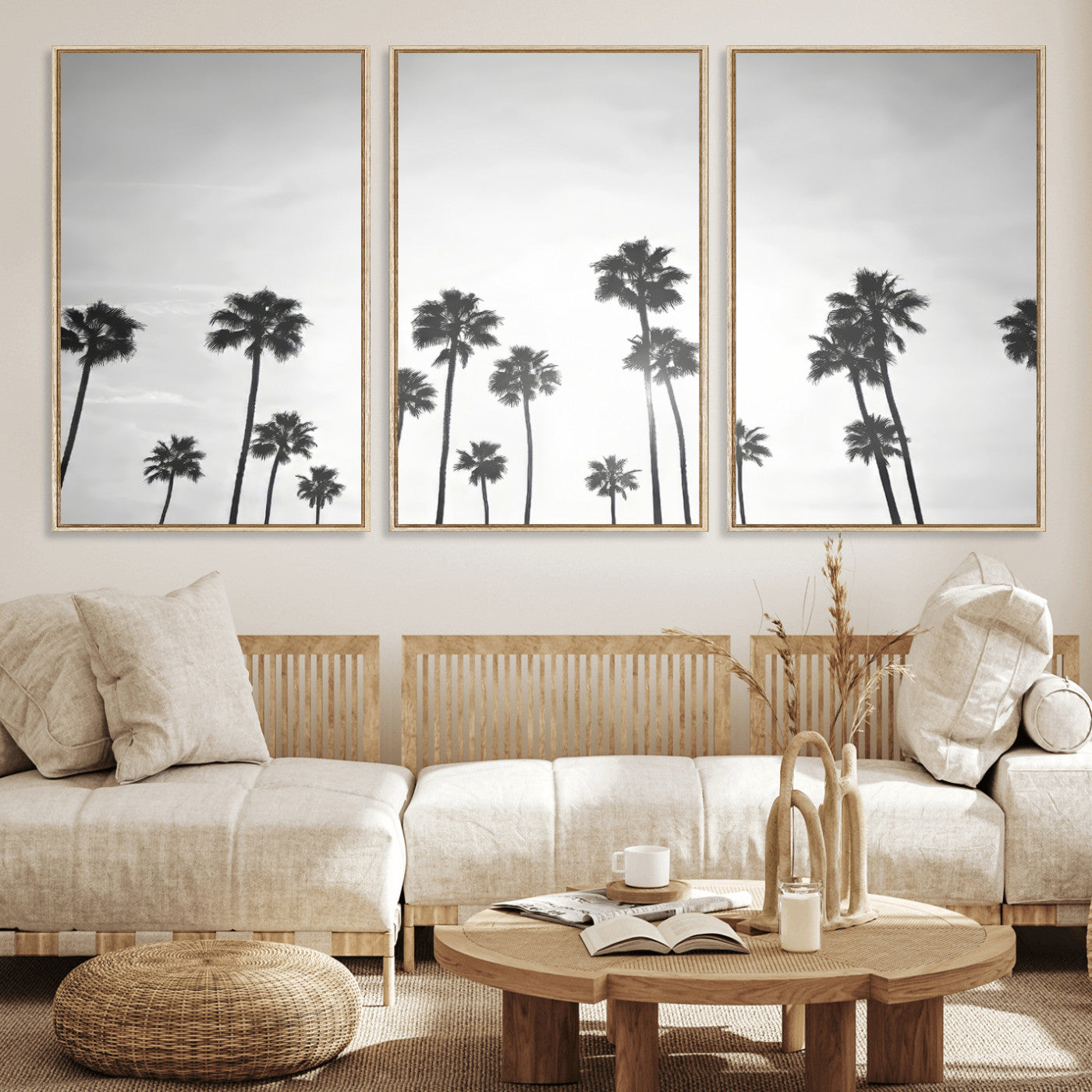A black and white minimalist scene featuring tall palm trees silhouetted against a bright sky, creating a dreamy and timeless tropical aesthetic.