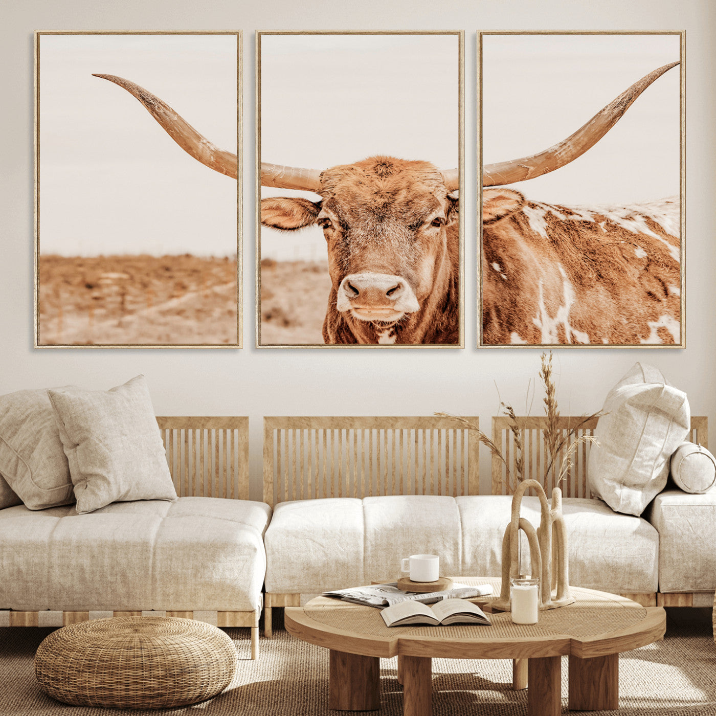 A longhorn bull standing proudly in a sunlit desert field with warm neutral tones, ideal for rustic western or farmhouse interiors.