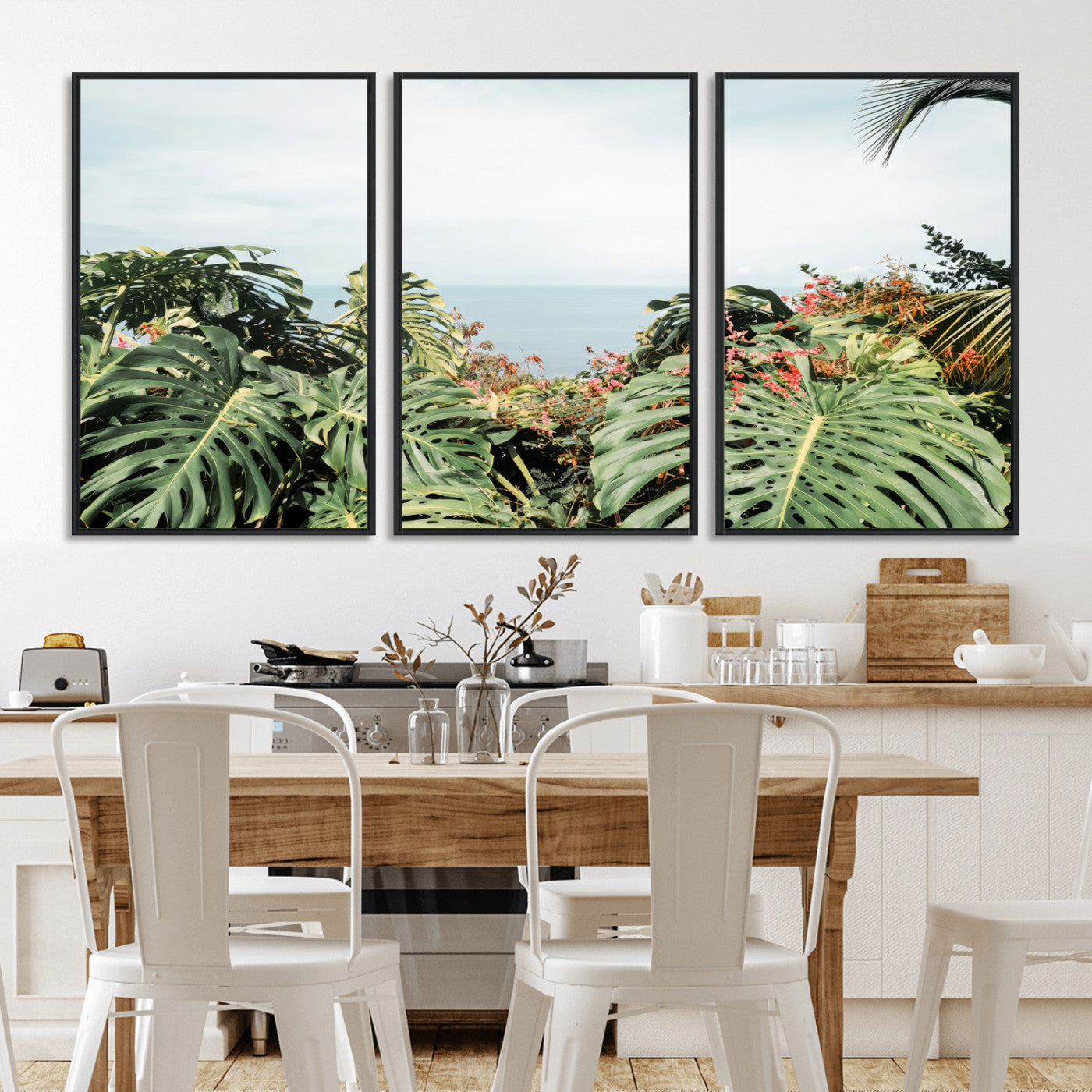 Monstera leaves and tropical flowers framing a calm ocean view, ideal for tropical coastal or exotic jungle-style interior wall decor.