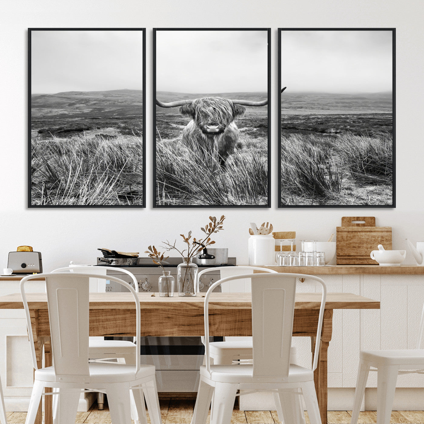 A black and white portrait of a Highland cow in a foggy Scottish countryside, capturing a rustic aesthetic and tranquil farm escape.