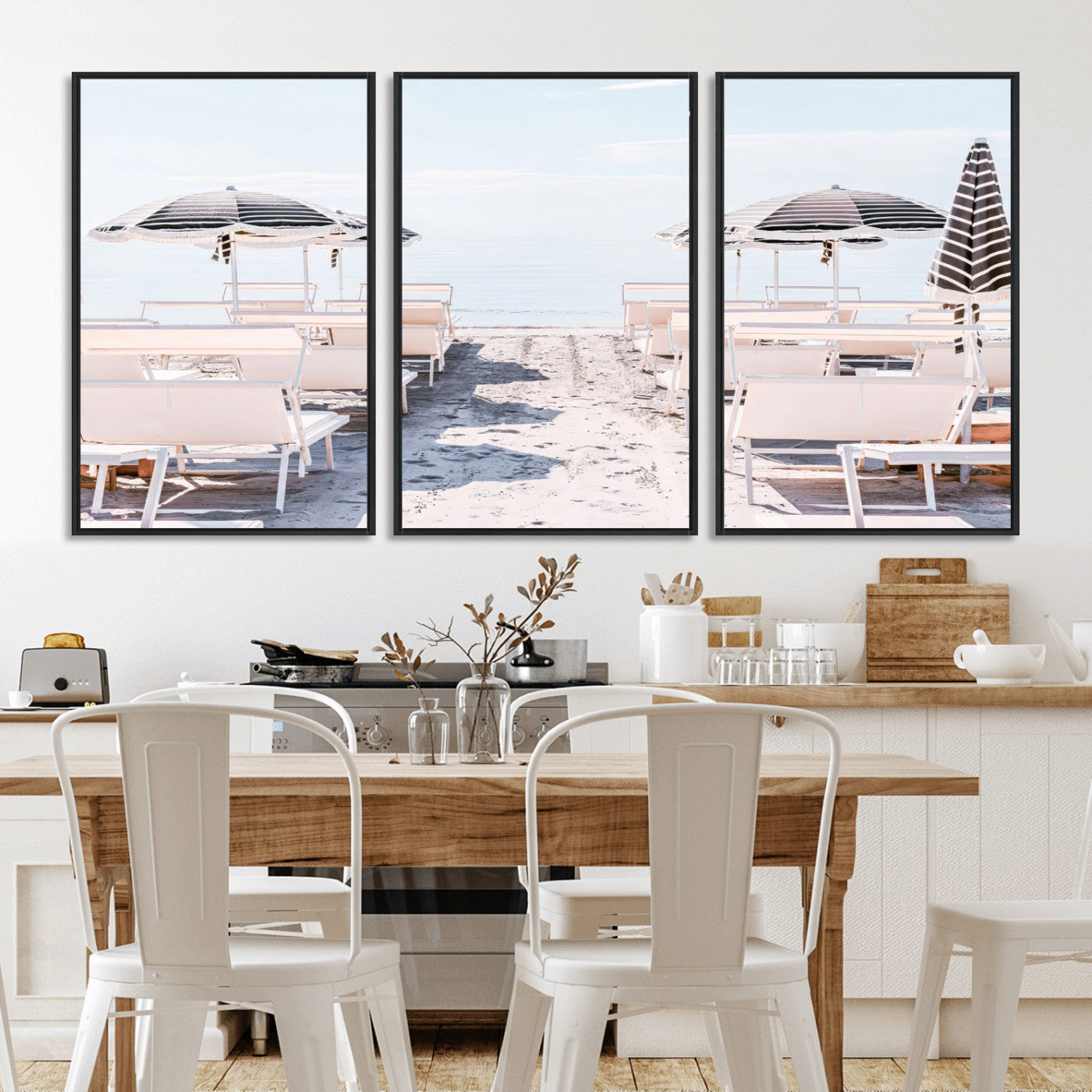 A serene minimalist beach scene featuring striped umbrellas, soft pastel sand, and an elegant lounge setup, creating a tranquil and stylish coastal retreat.