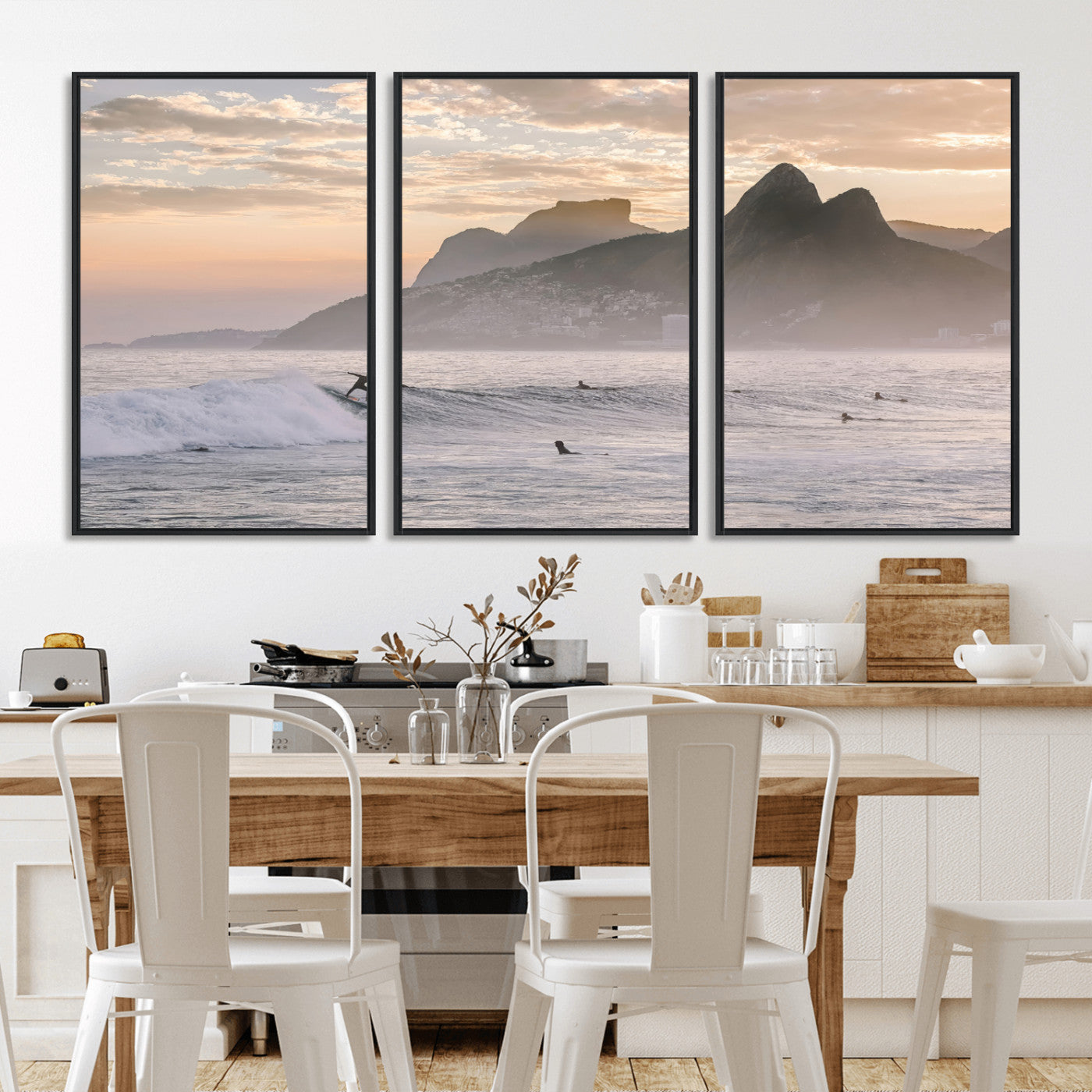A surfer rides a golden hour wave near misty coastal mountains, surrounded by fellow surfers, capturing the spirit of a coastal adventure.
