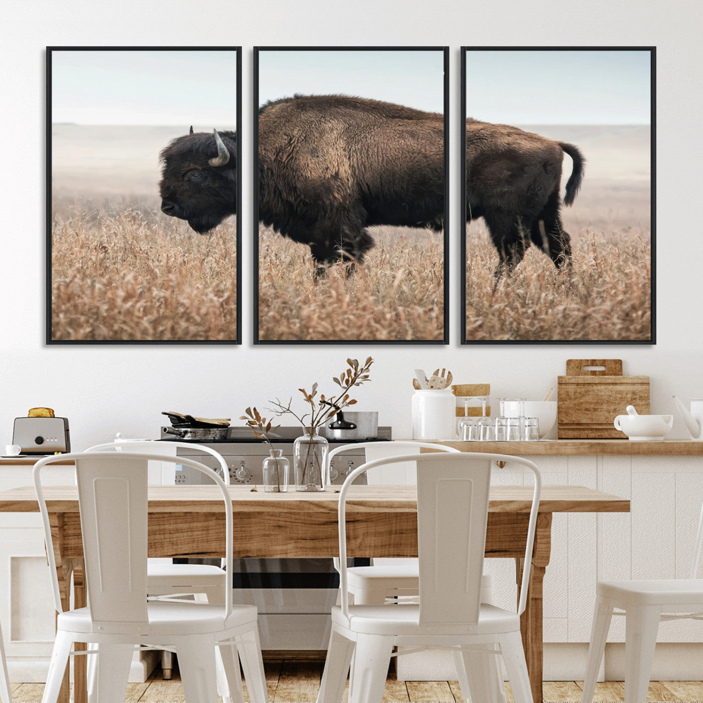 A lone bison stands in a vast prairie under a soft sky, evoking freedom and rustic charm for western or farmhouse inspired interiors.