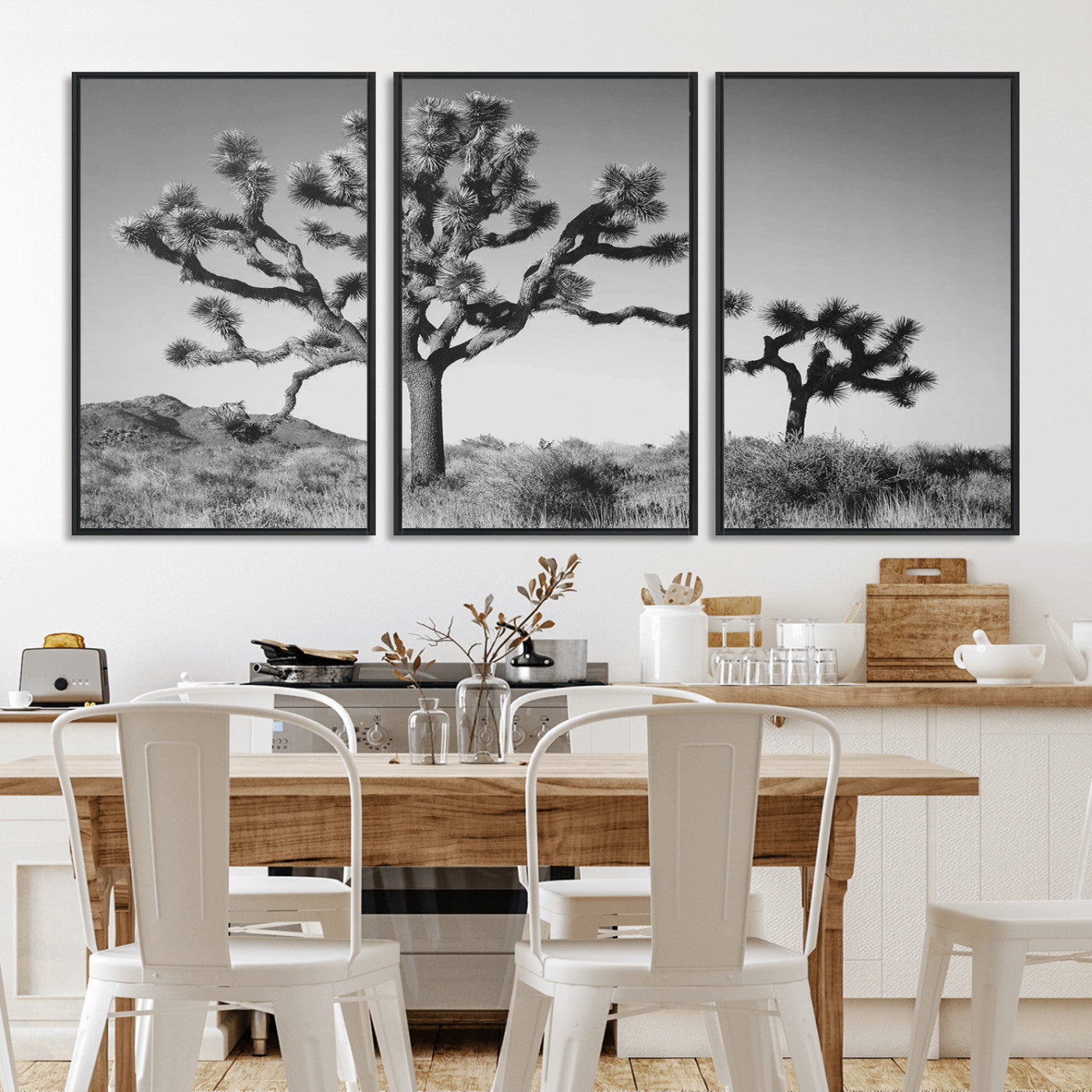 Black and white Joshua trees in a rugged desert landscape, creating a calm and minimalist feel for natural or rustic-themed interiors.