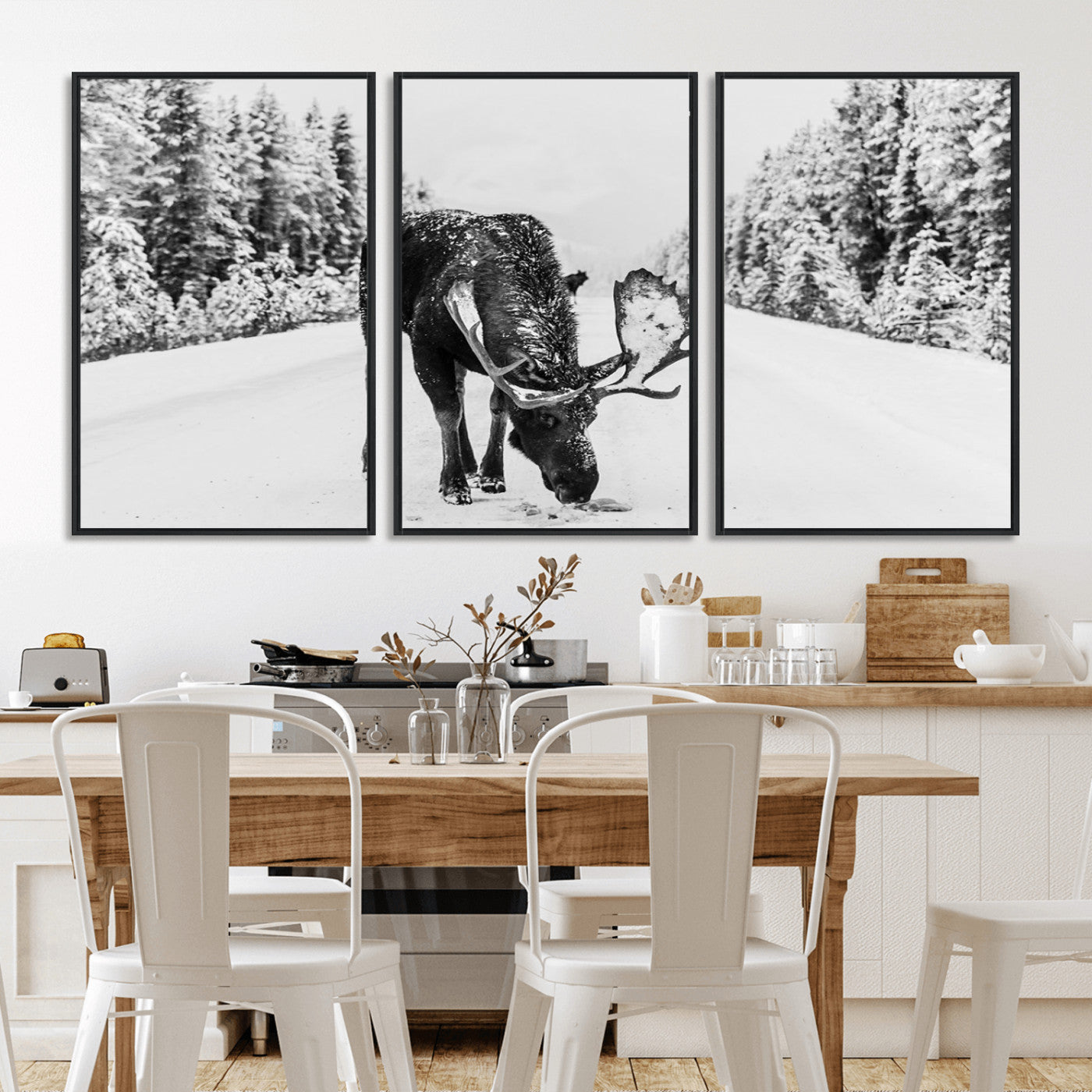 A majestic moose grazing in the snow-covered wilderness, surrounded by snow-covered trees, creating a peaceful winter scene.