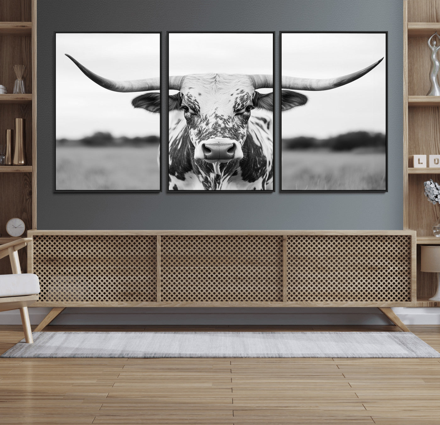 Capture the strength and elegance of nature with this striking black and white portrait of a longhorn cow. Its powerful presence makes a bold statement in any room.